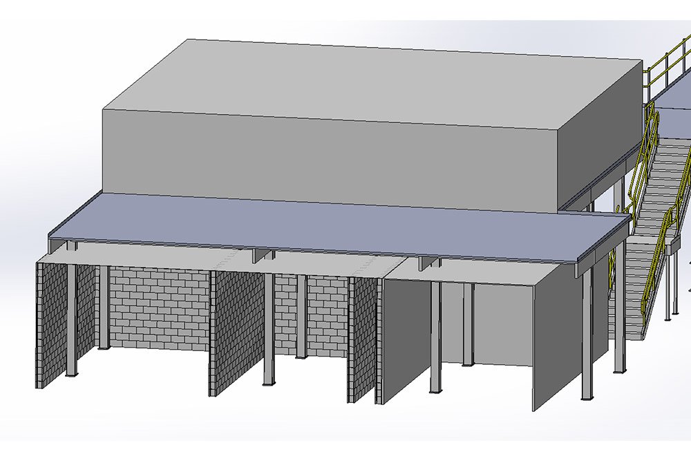 The mezzanine was situated over existing brick+mortar structure and had to have columns placed inside restrooms to ensure proper column spacing.