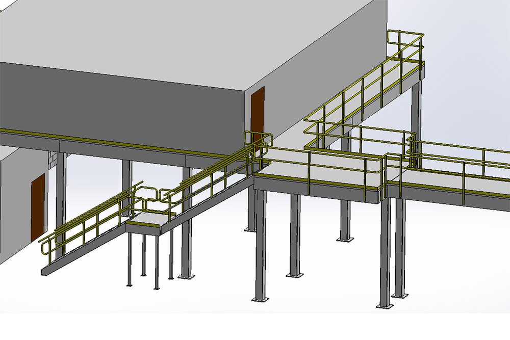 Mezzanine stairs provide access to the modular building that houses Maintenance+Engineering offices.