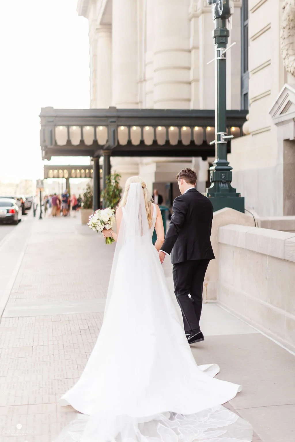 Newlyweds outside Kansas City wedding venue