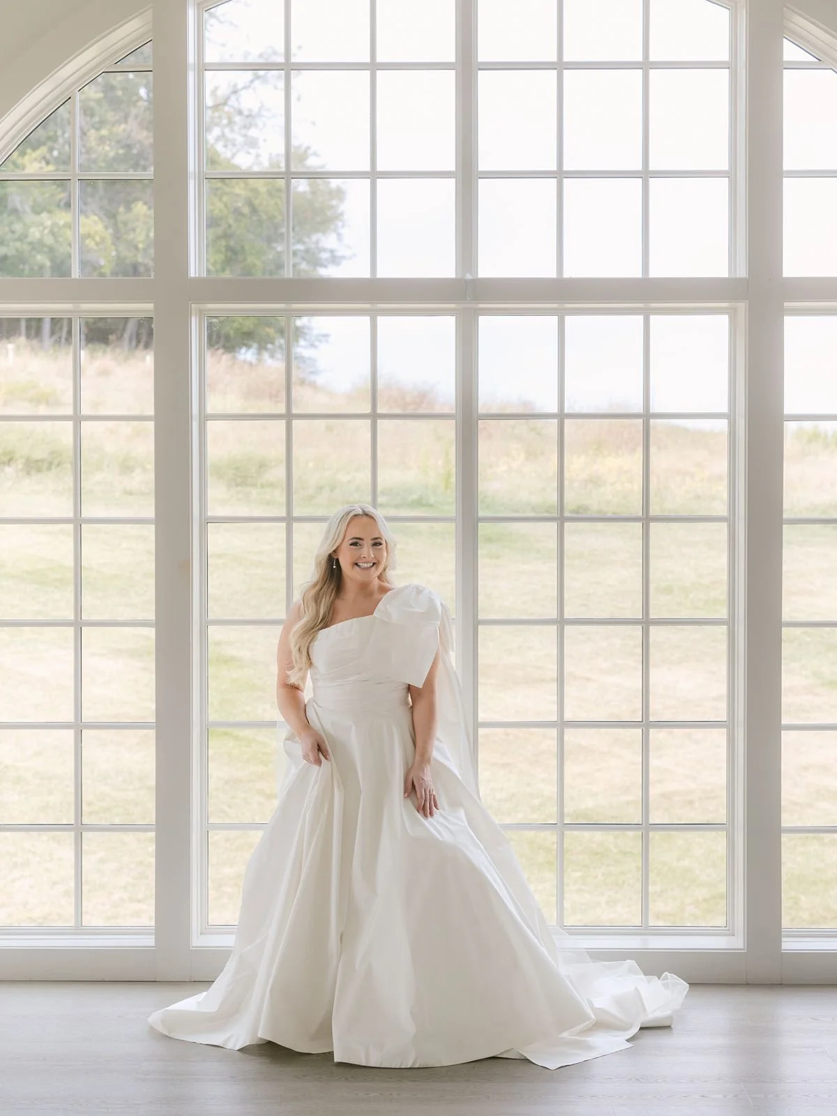 Bride smiles for portrait at Westwind Hills wedding
