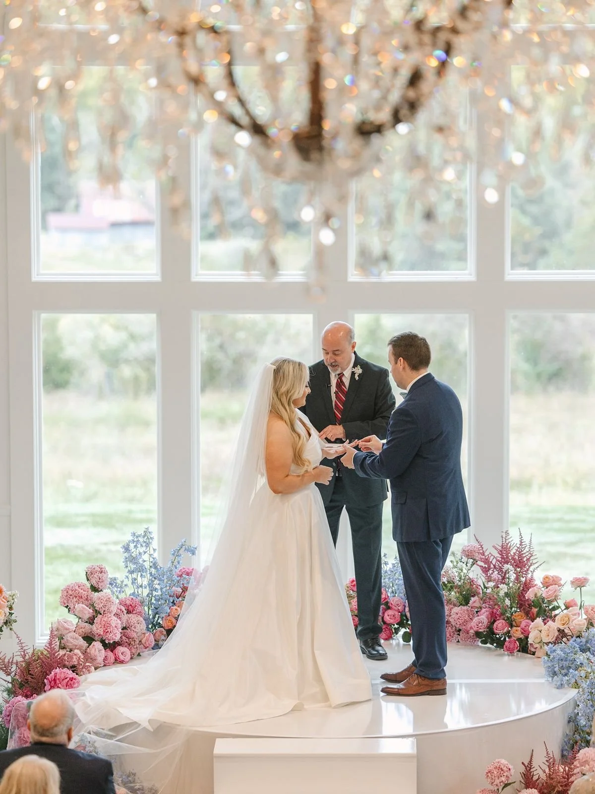 Bride and groom exchange vows at wedding ceremony
