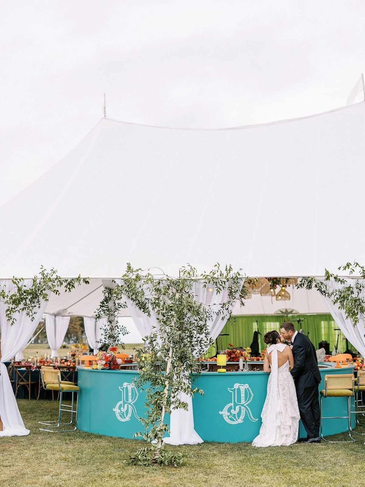 Tented wedding in Kansas City with custom bar