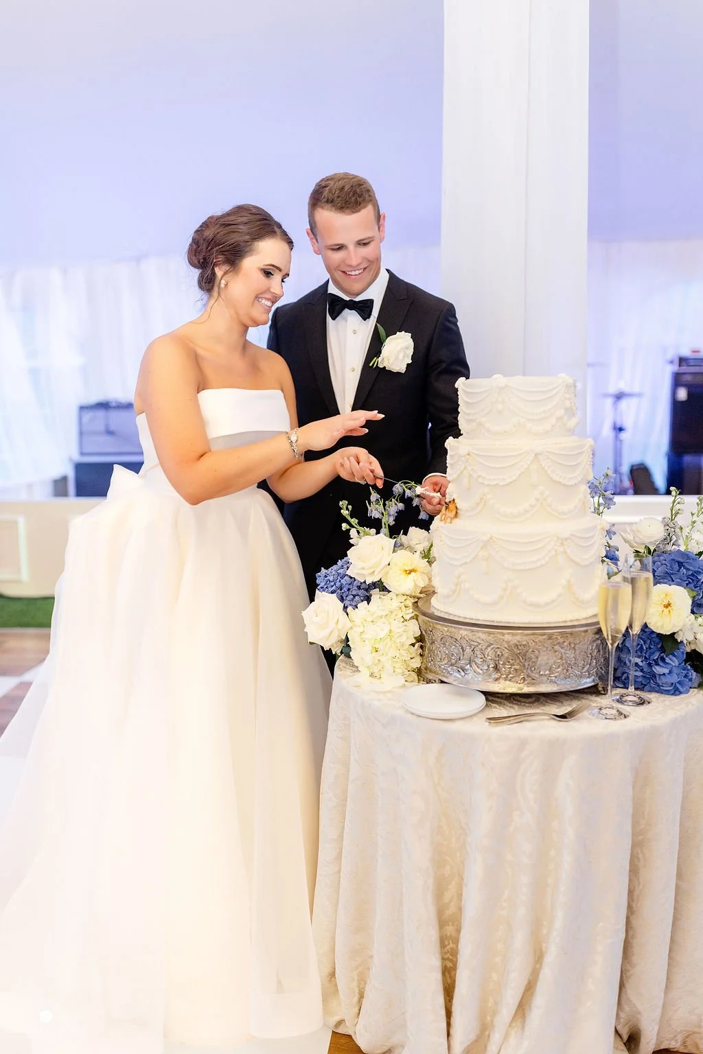 Bride-Groom-Cut-Cake-Tented-Wedding-Reception-Missouri.jpg