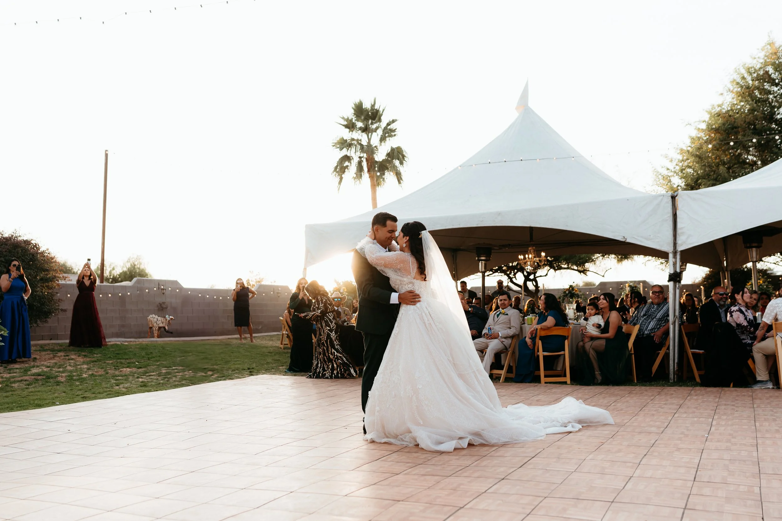 Outdoor first dance beneath a sailcloth tent at Villa de la Meza.