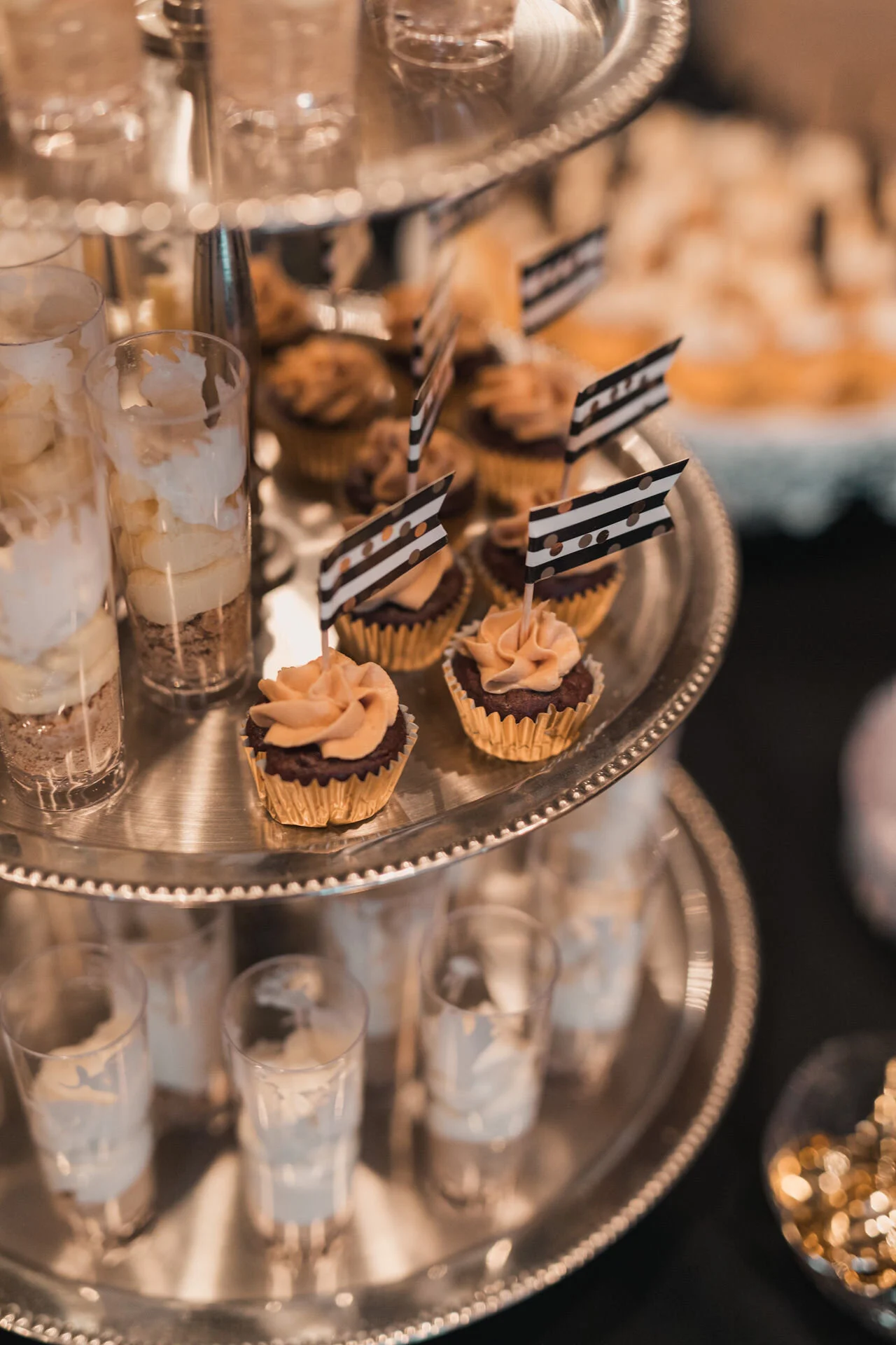 Tiered dessert display prepared for wedding guests.