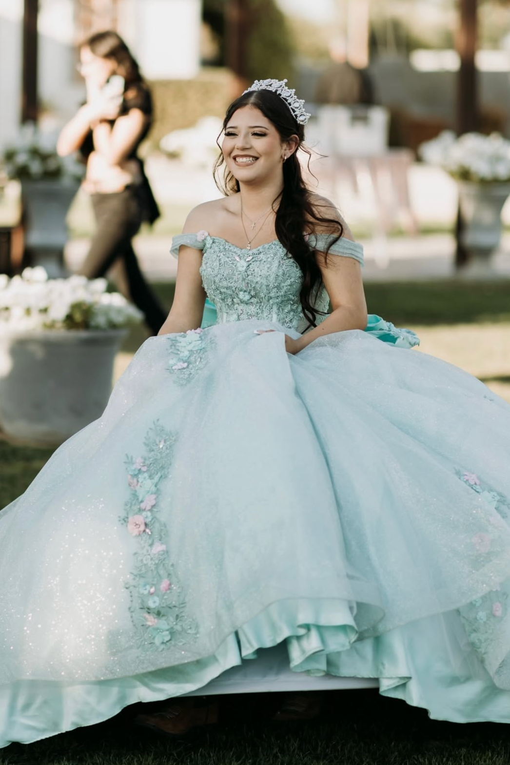 Elegant quinceañera portrait at Villa de la Meza private event venue in Yuma, Arizona.