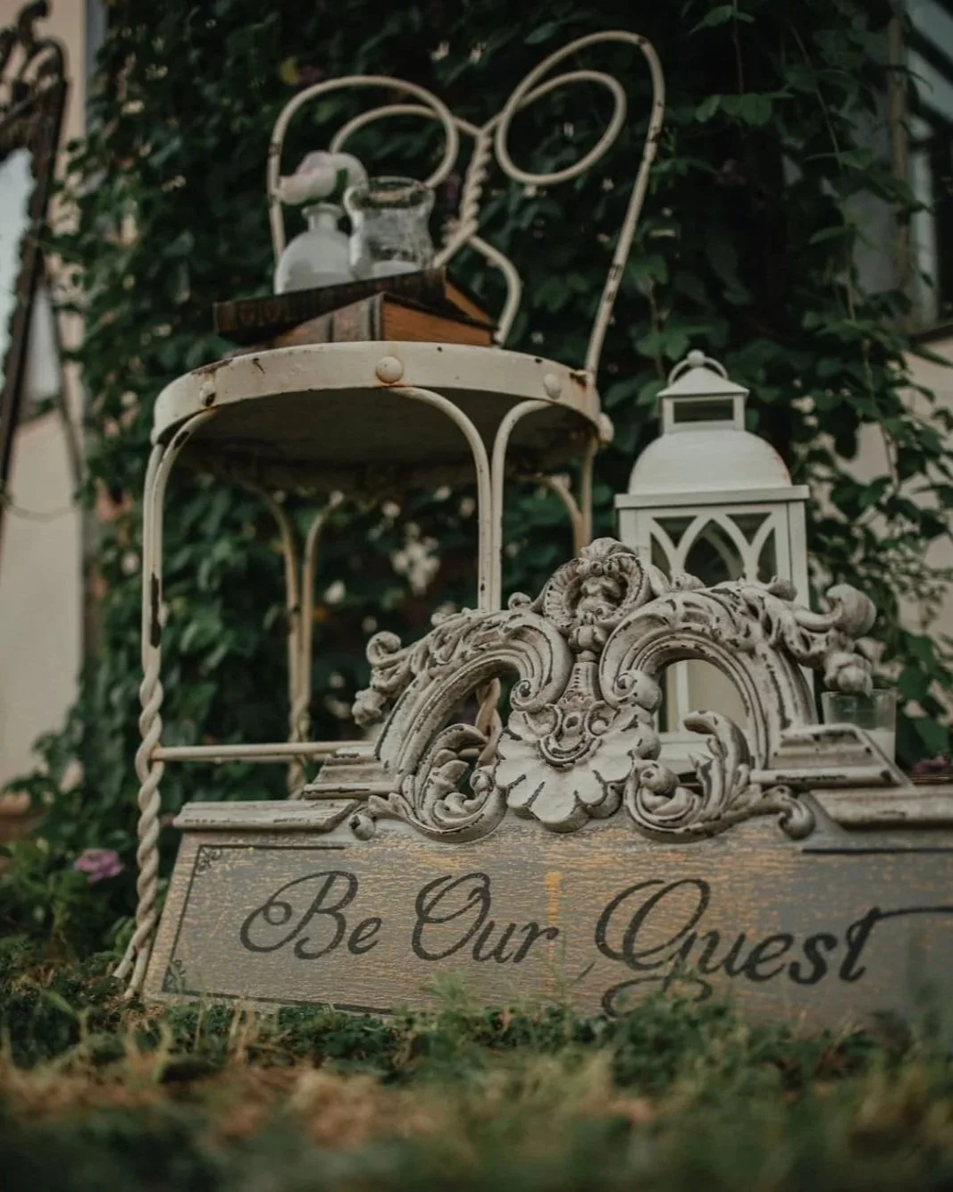 Vintage "Be Our Guest" sign welcoming visitors to Villa de la Meza's private event venue in Yuma, Arizona.