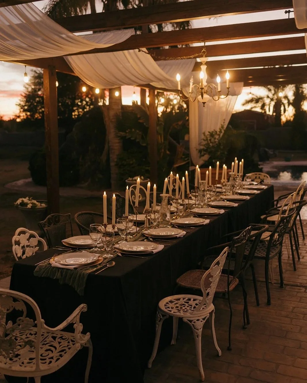 Elegant outdoor dining setup prepared for an intimate private gathering at Villa de la Meza.