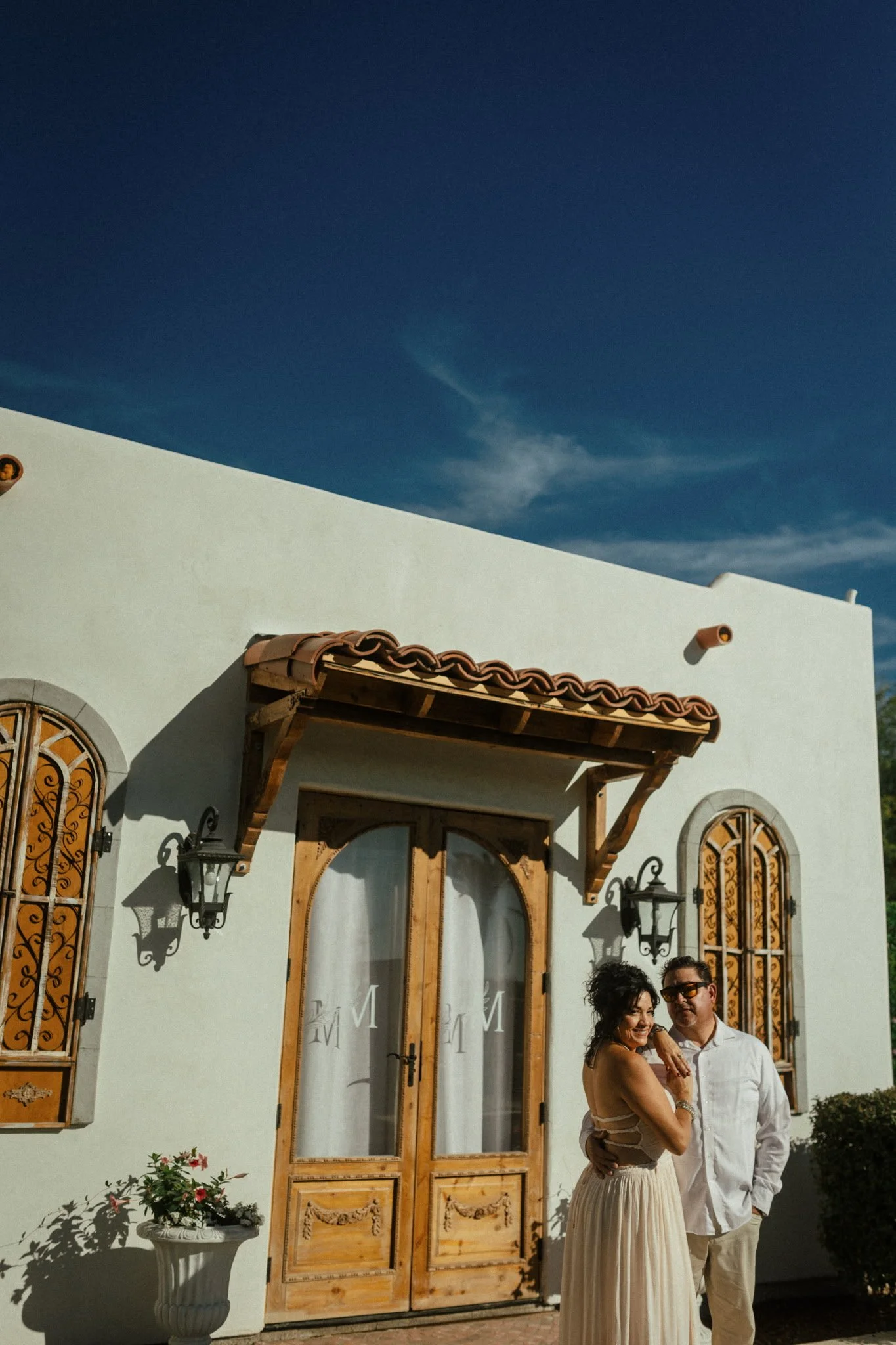 Owners of Villa de la Meza welcoming guests at their family-owned private event venue in Yuma, Arizona.