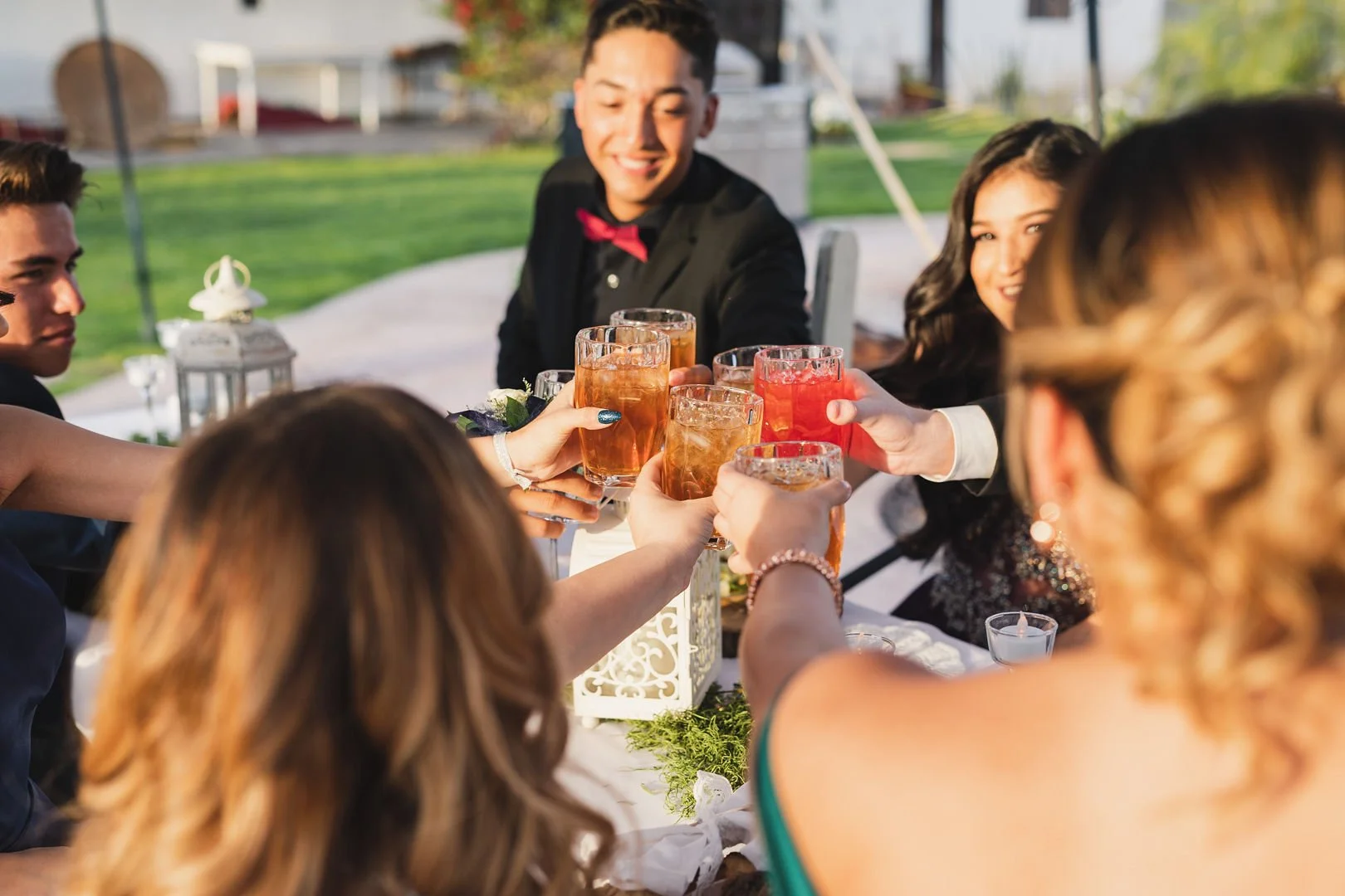 Family and friends raising a toast during a private celebration at Villa de la Meza in Yuma, Arizona.