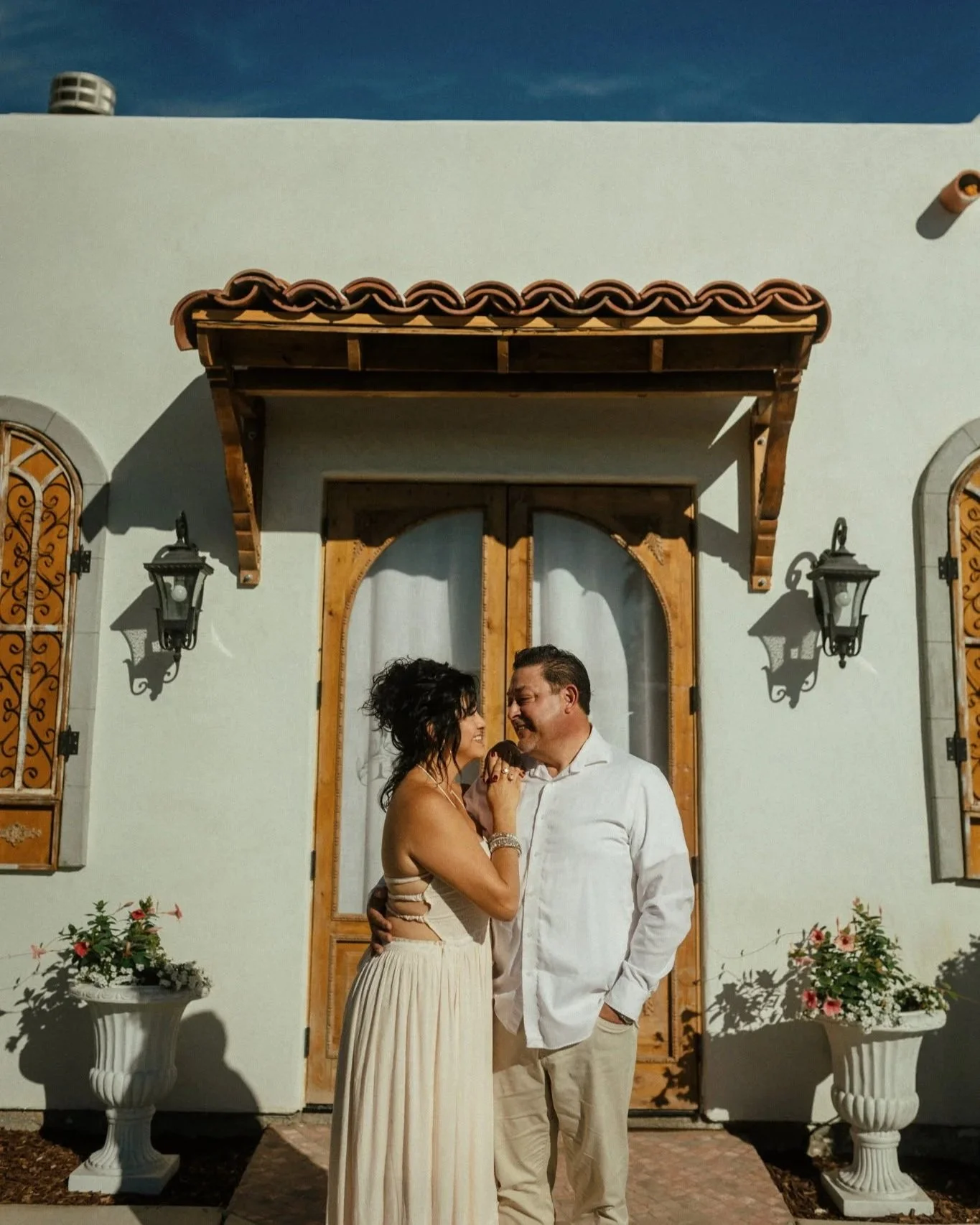 Owners of Villa de la Meza welcoming guests at their family-owned wedding and event venue in Yuma, Arizona.