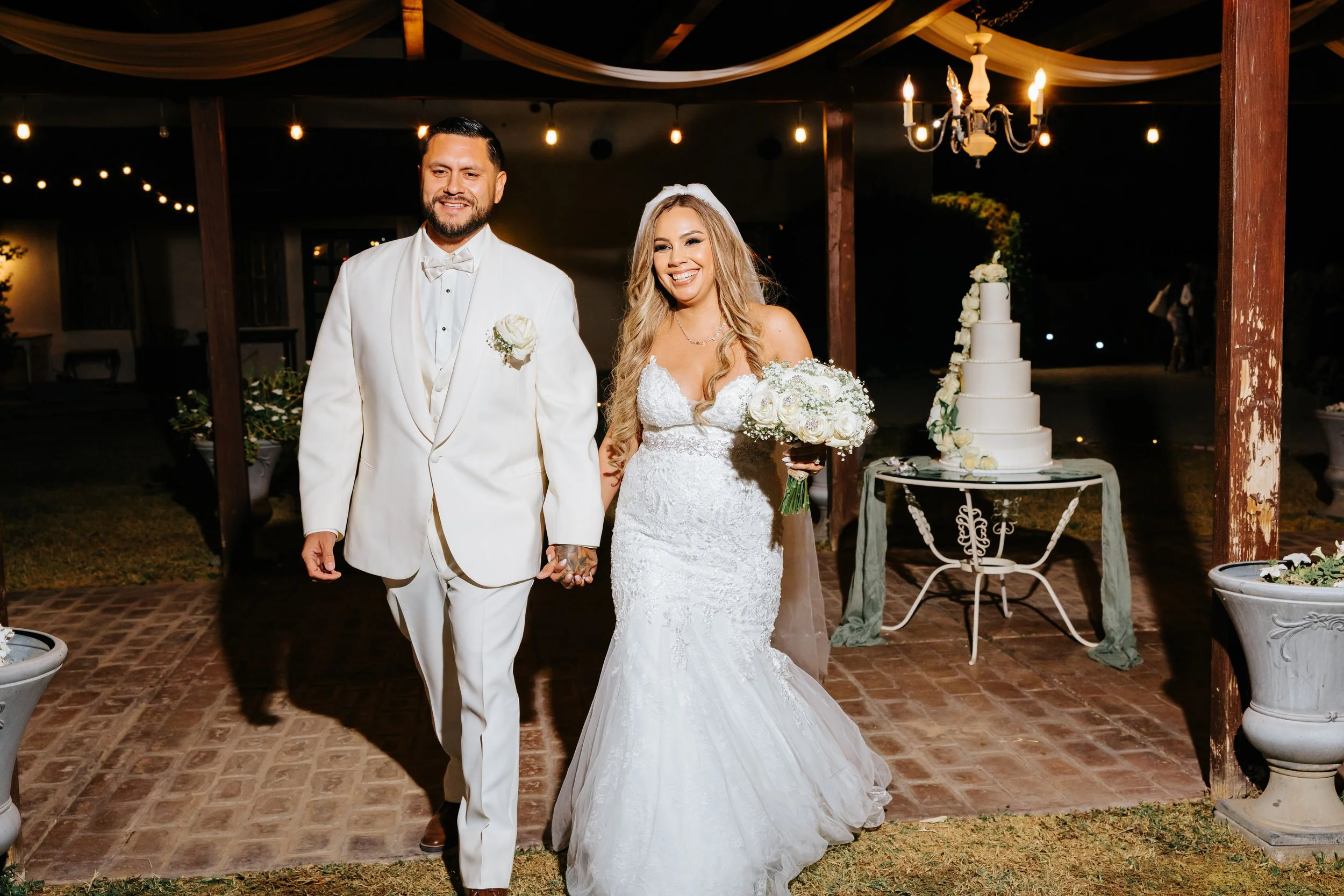 Newlyweds celebrating during their wedding reception.