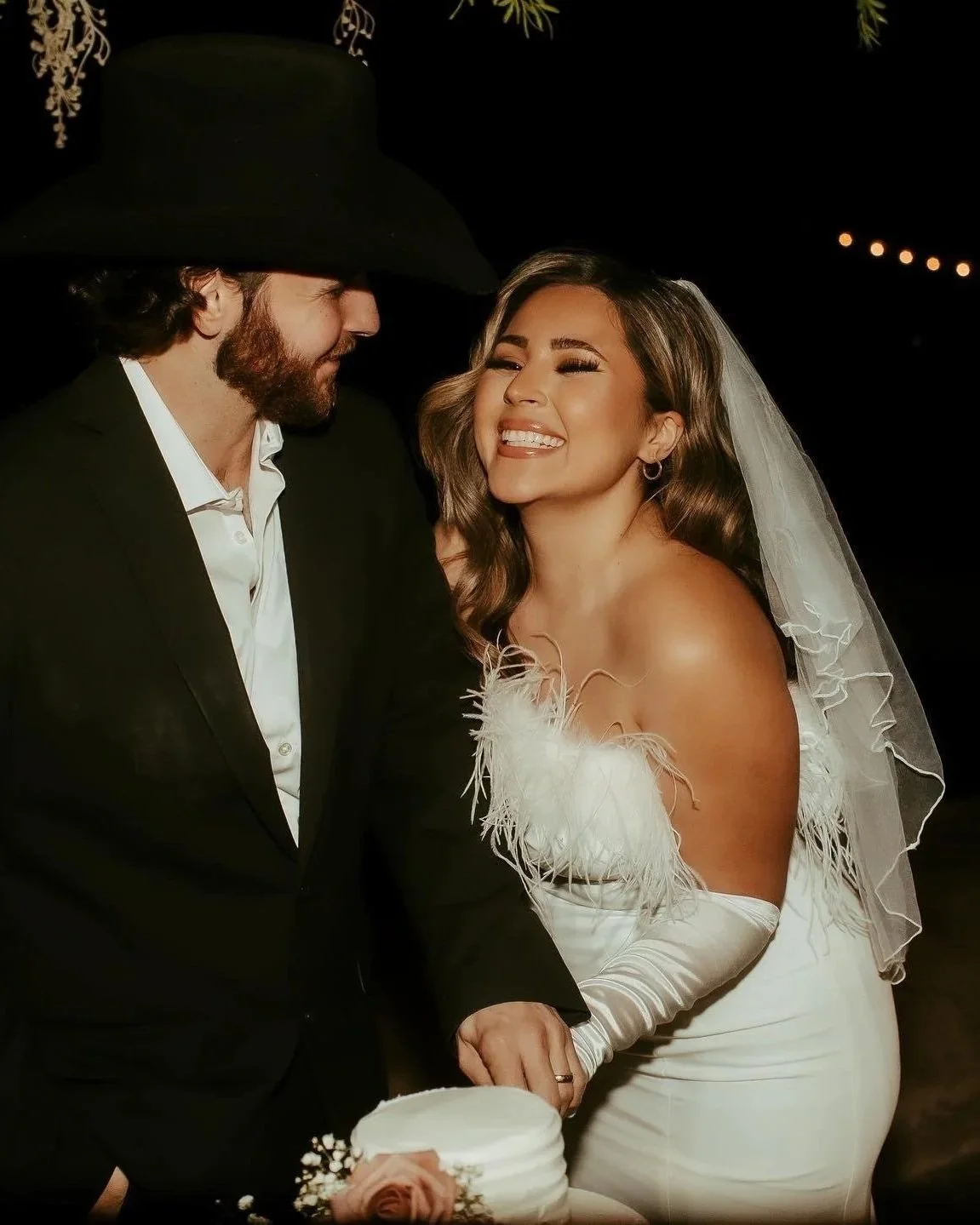 Bride and groom celebrating together during a wedding reception at Villa de la Meza.