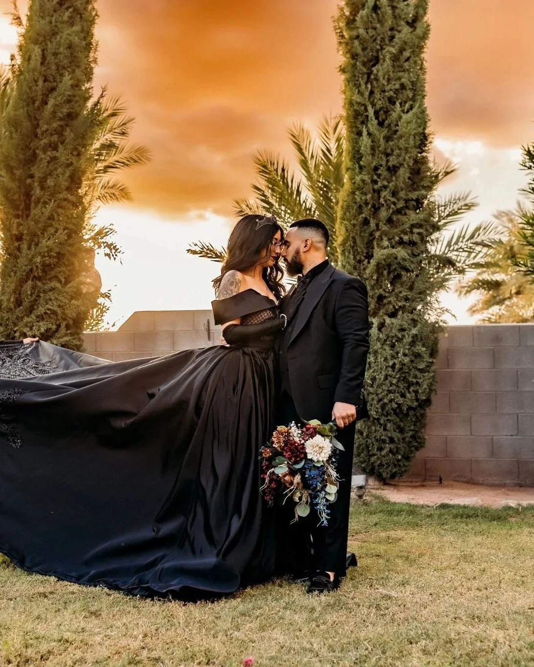 Couple embracing at sunset during an engagement session at Villa de la Meza.