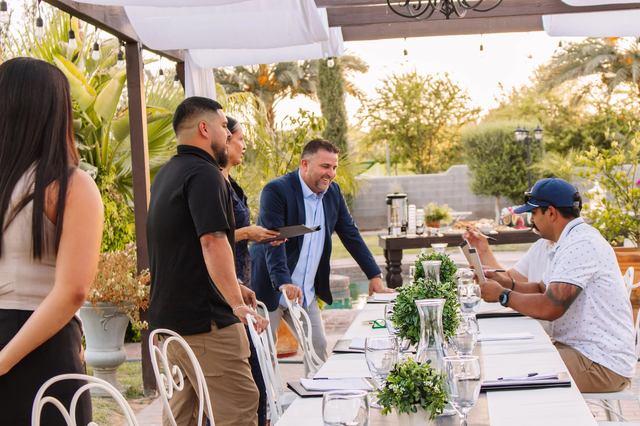 Business team participating in an executive meeting at Villa de la Meza in Yuma, Arizona.