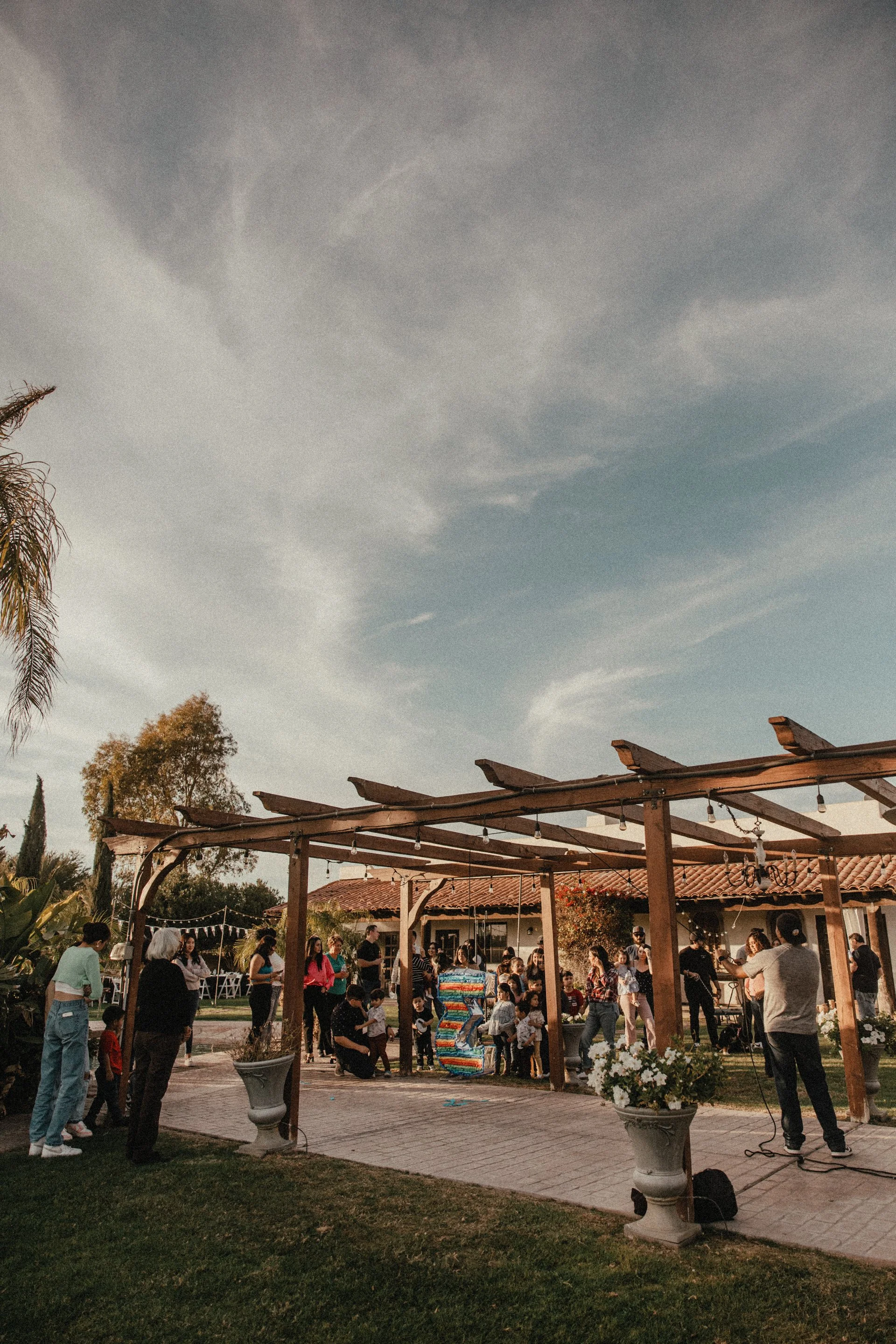 Beautifully decorated private event venue with warm evening lighting at Villa de la Meza in Yuma, Arizona.