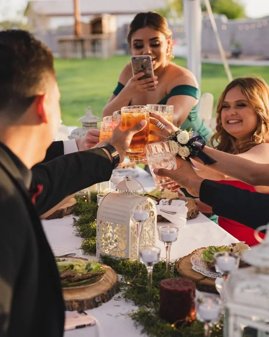 Guests raising a toast during a private celebration at Villa de la Meza in Yuma, Arizona.