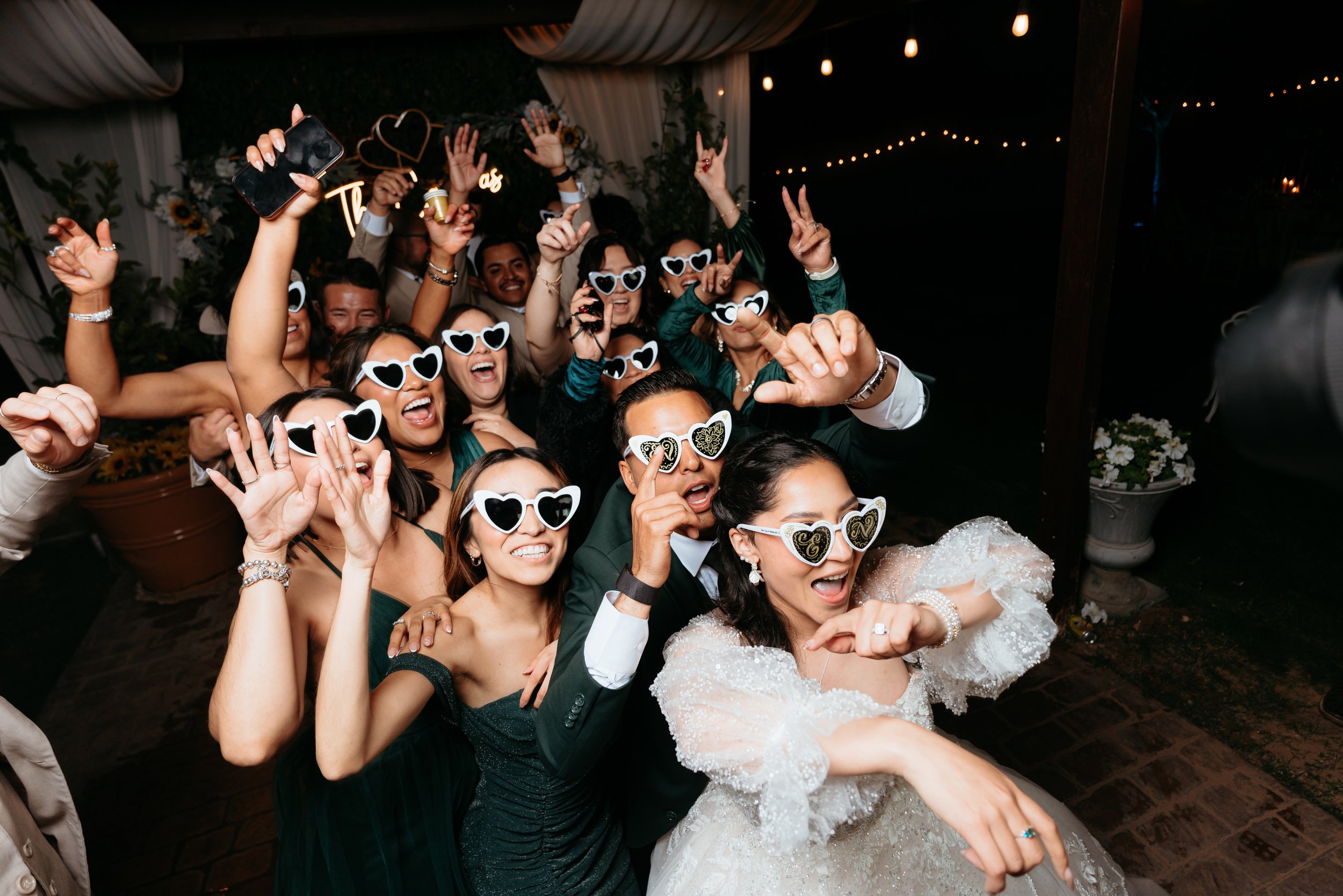 Wedding guests celebrating together during an evening reception at Villa de la Meza.