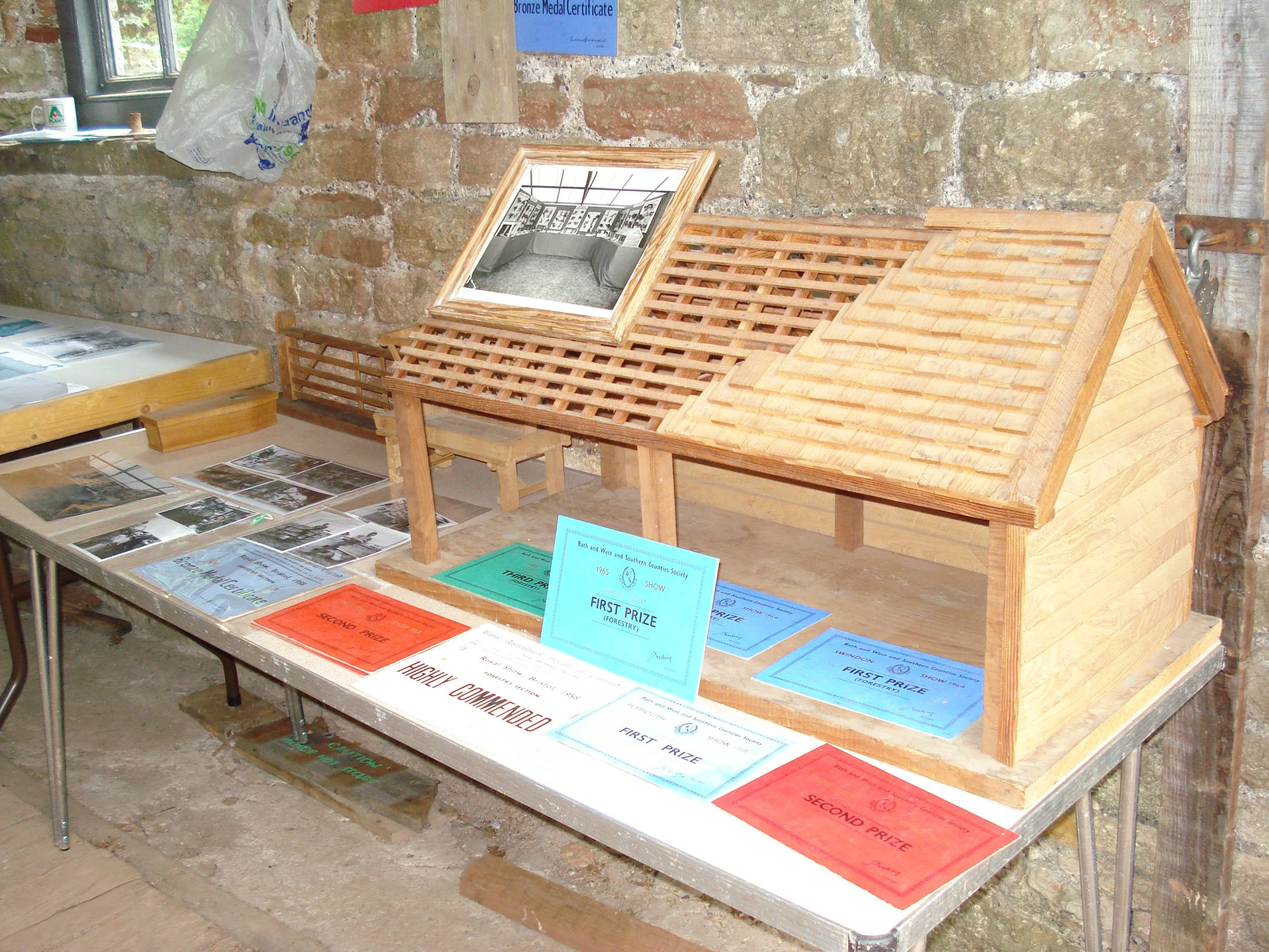 Showing off Bath & West Prizes for models and carpentry displays made over the years