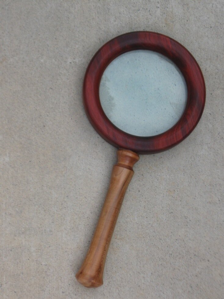 Mike Moore magnifying glass 
