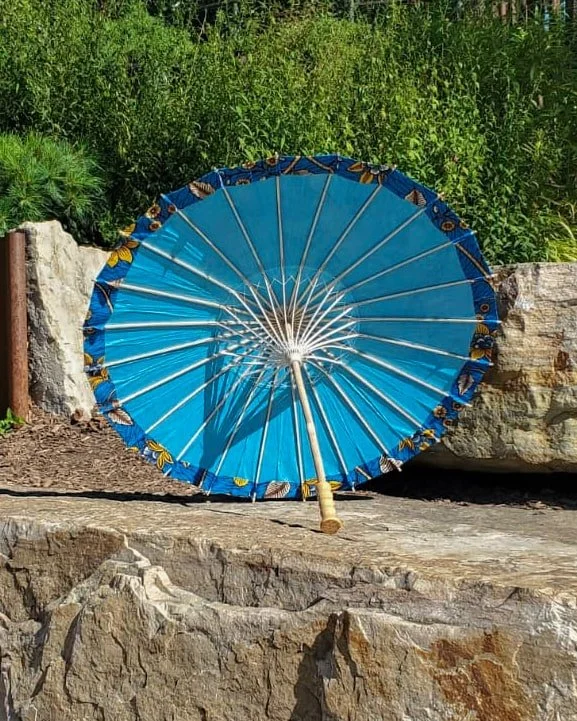pietersite handmade parasol interior, medium size, with afro-inspired design on a stone slab