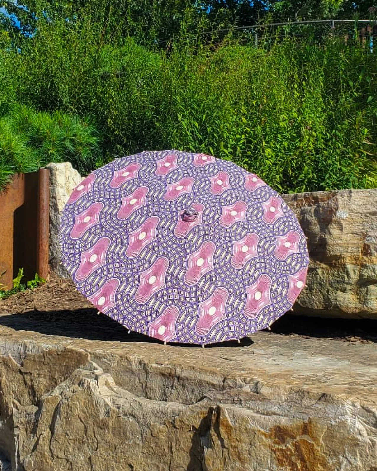 grape agate handmade parasol exterior, medium size, with afro-inspired design on a stone slab
