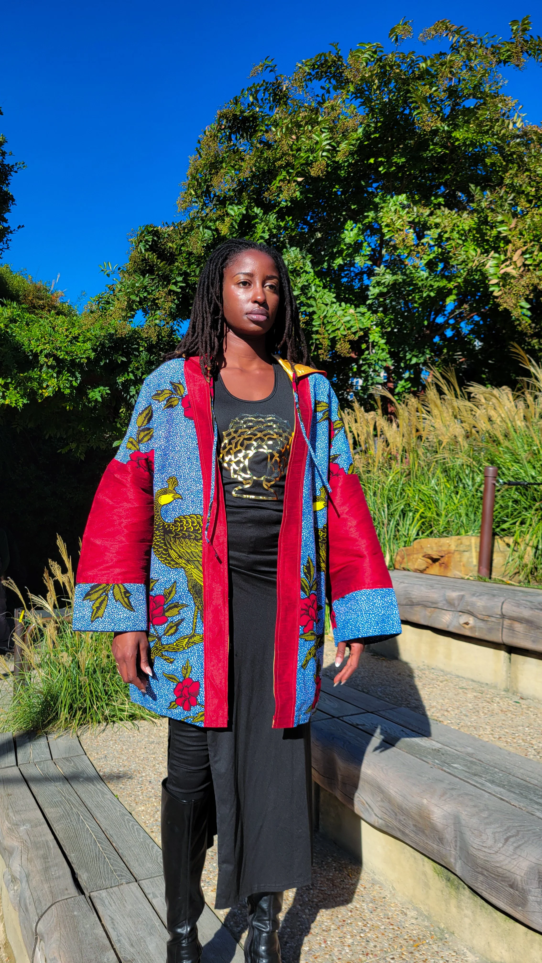 front facing woman wearing a chalcanthite haori inspired kimono jacket