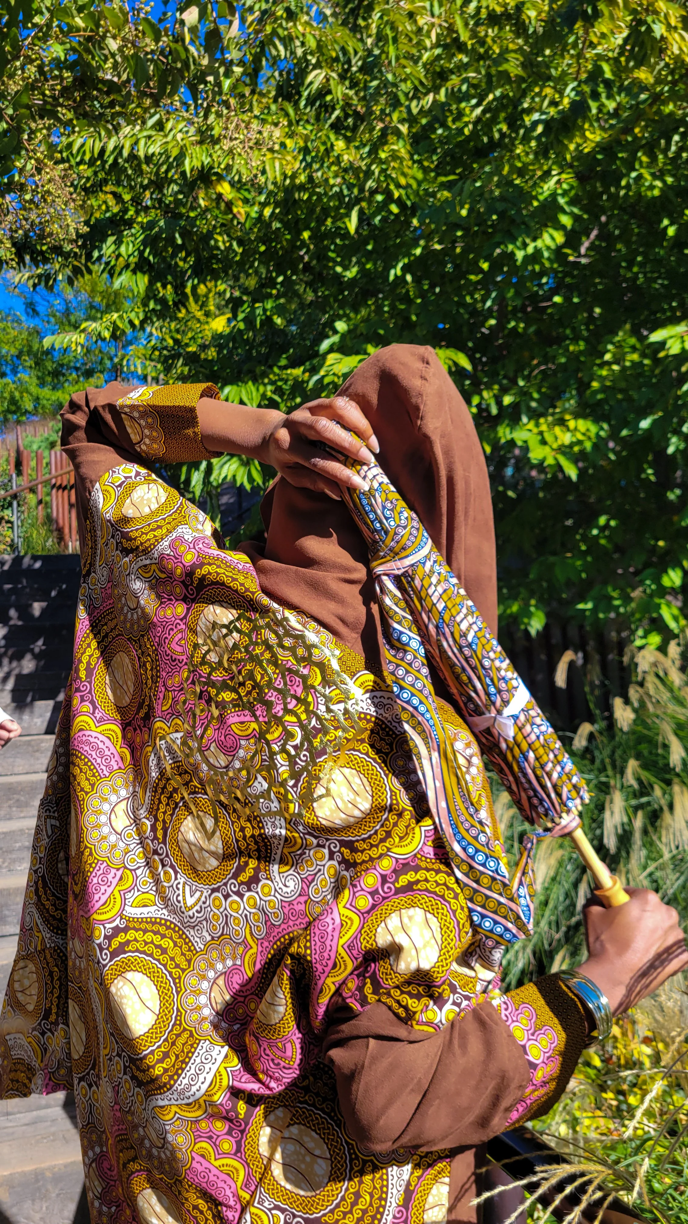 Noreena Jasper haori kimono jacket worn by a woman holding a handmade parasol