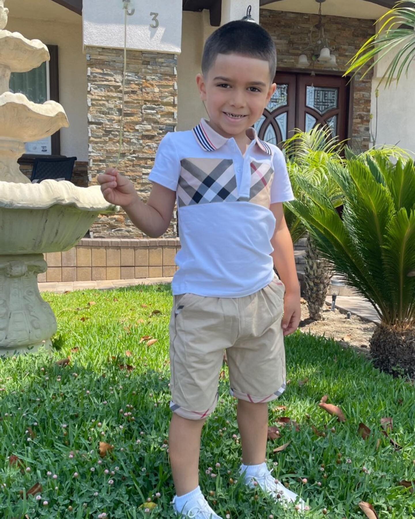 Handsome wearing our front plaid polo  and shorts are from our sets 😍 
Shop online 
Www.Bossykidz.com