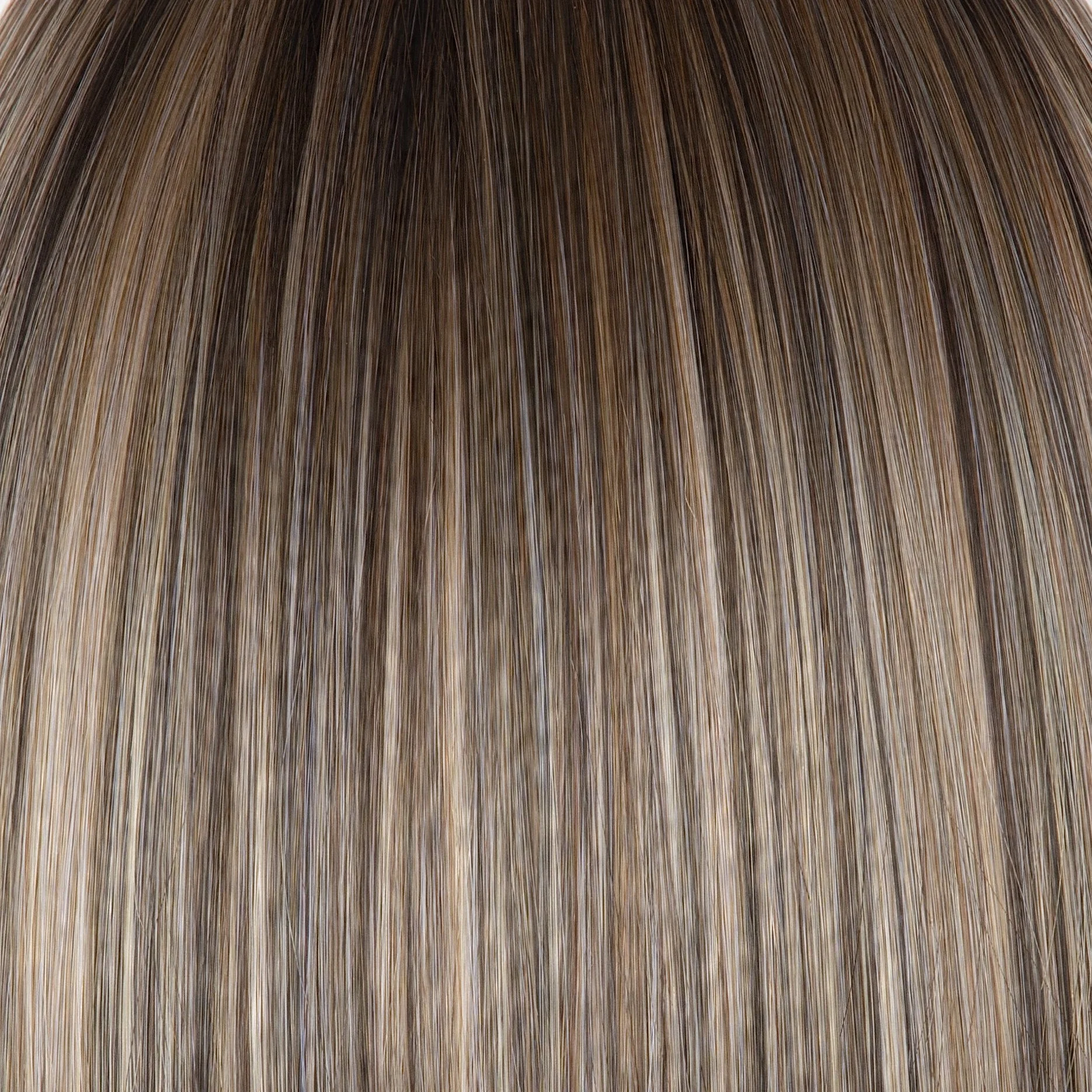 BRONDE-R | Dark brown and natural medium blond tones are mixed together and shaded with medium dark brown roots for a realistic appearance