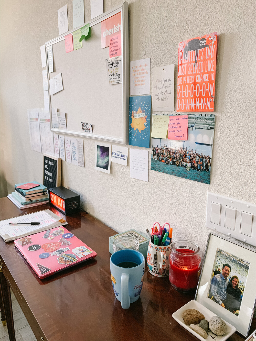 My workspace is a little ‘temporary’ - we got this console table from one of my husband’s friends who didn’t have space in their next place and I turned it into my little desk. While I don’t particularly like the aesthetics of it, I do believe in extending the life cycle of items - and I just place things that mean a lot to me on it! Try to spot one of my ‘do not disturb’ cues!