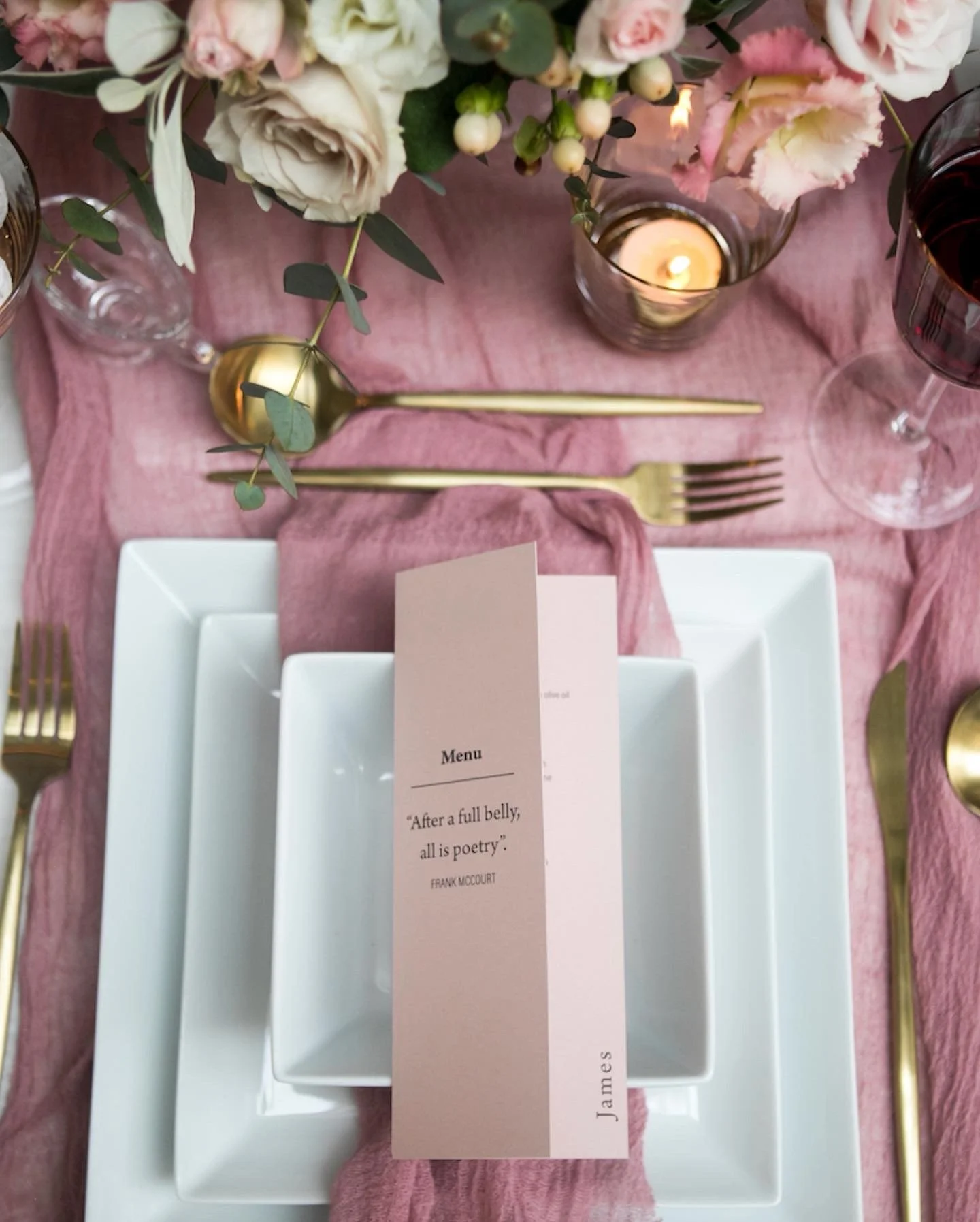 A beautifully positioned personalised menu with elegant typography and the guests name protruding on the right