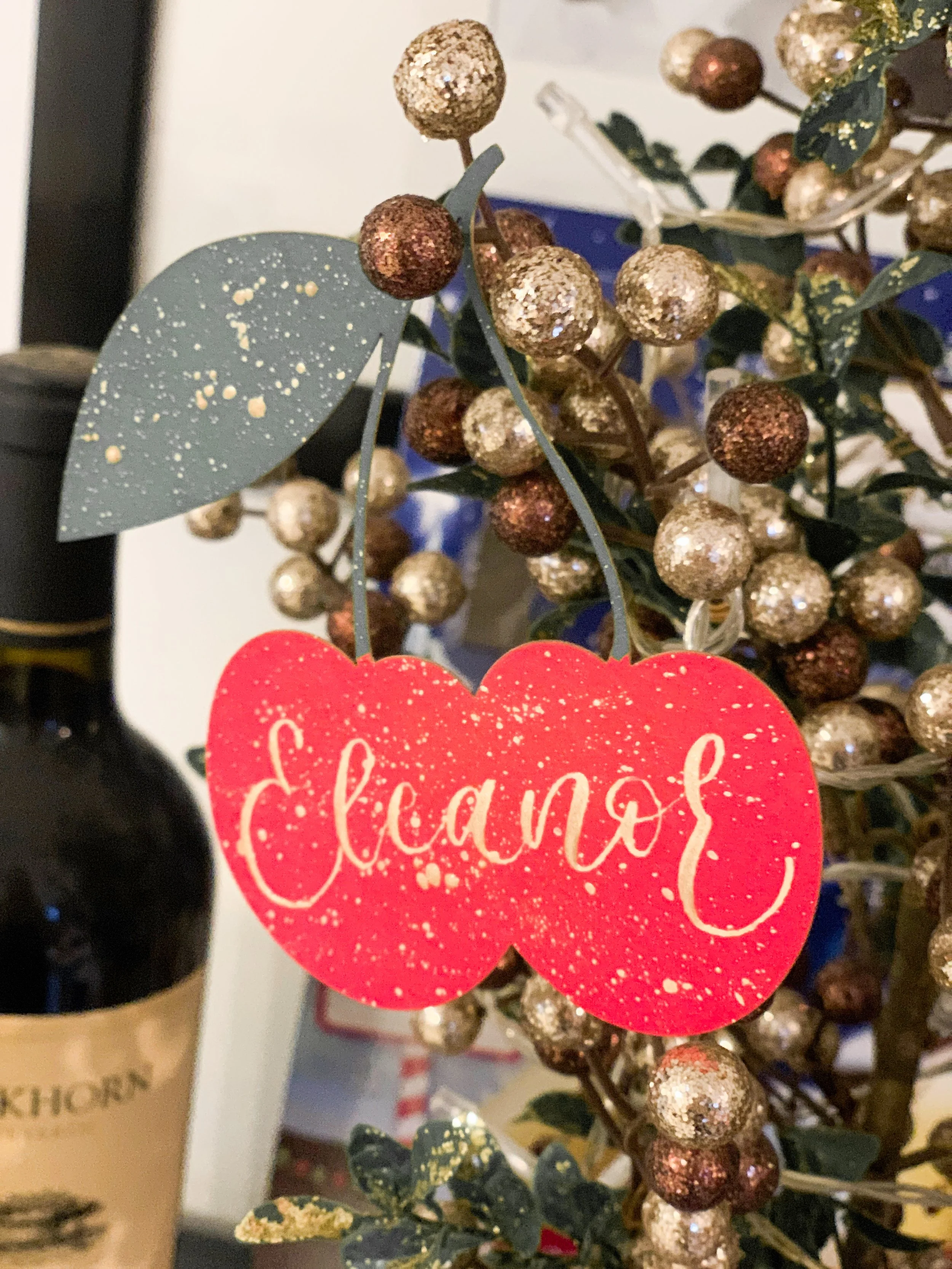 Diecut and printed cherry place names - finished with a gold calligraphy name