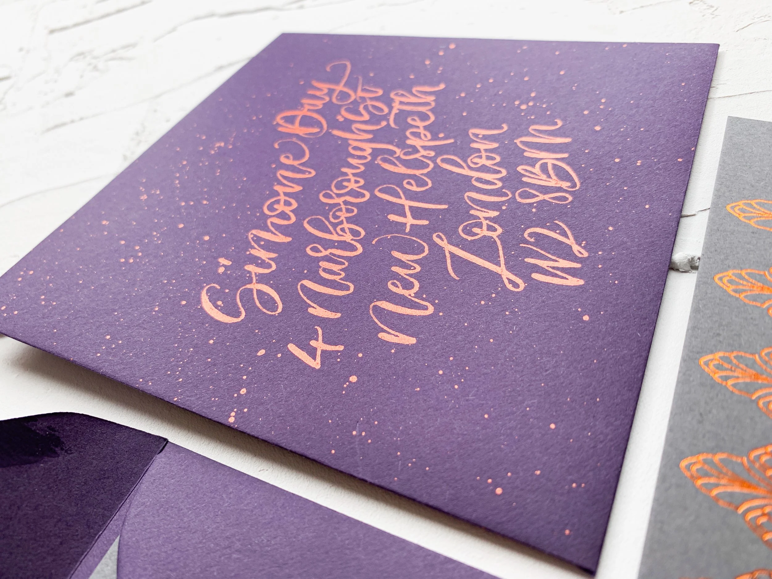 Purple and copper ink calligraphy envelopes 