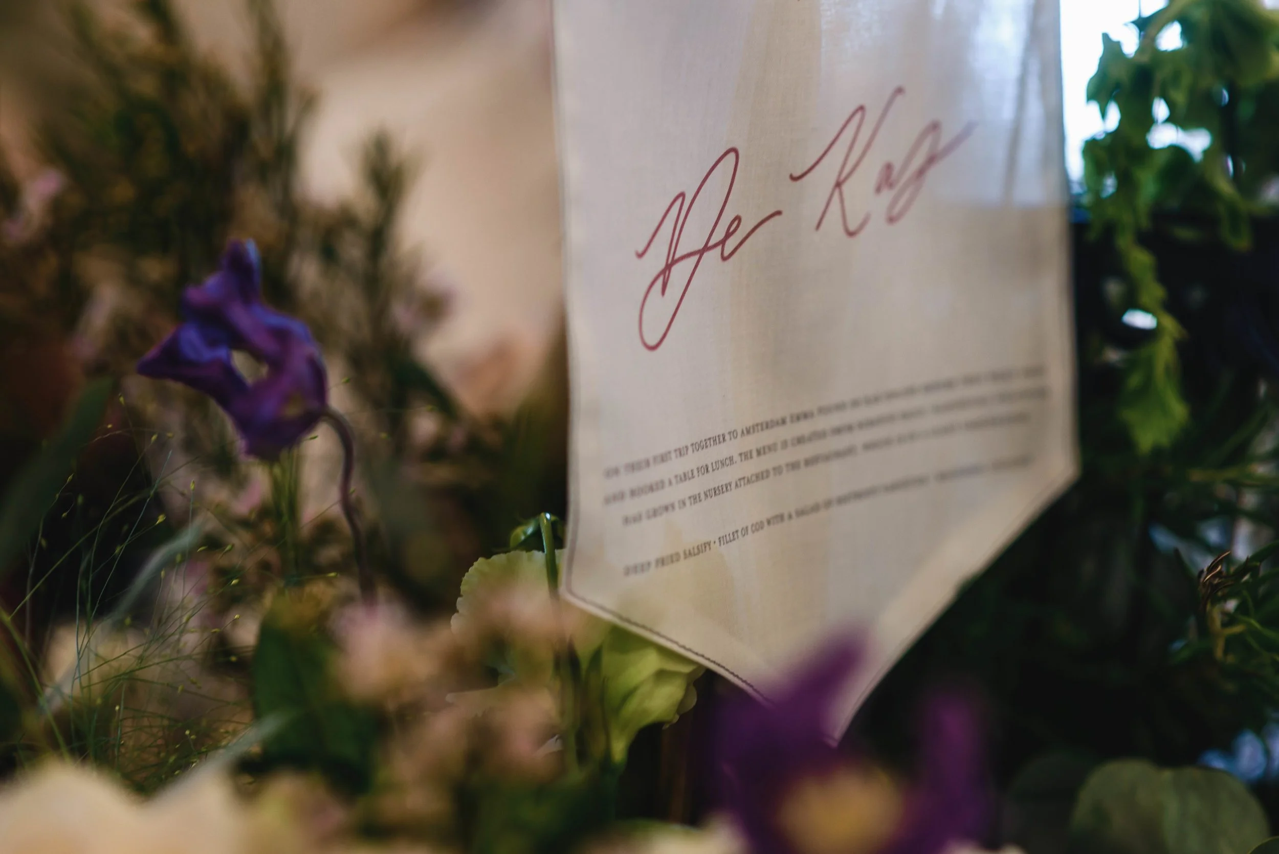 Fabric flags printed with the restaurants and the story behind it