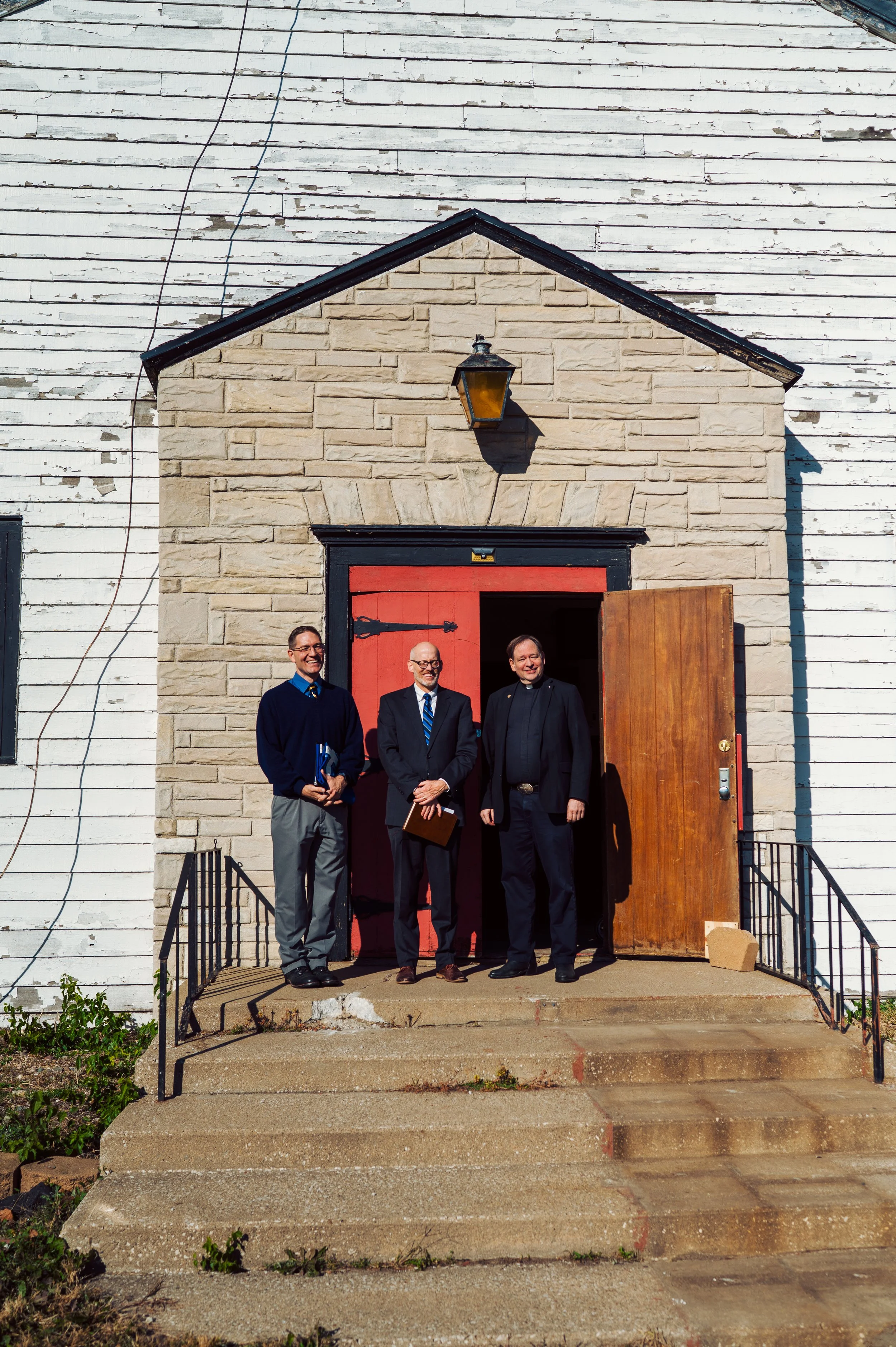 Clergy on the doorstep of the Chapel