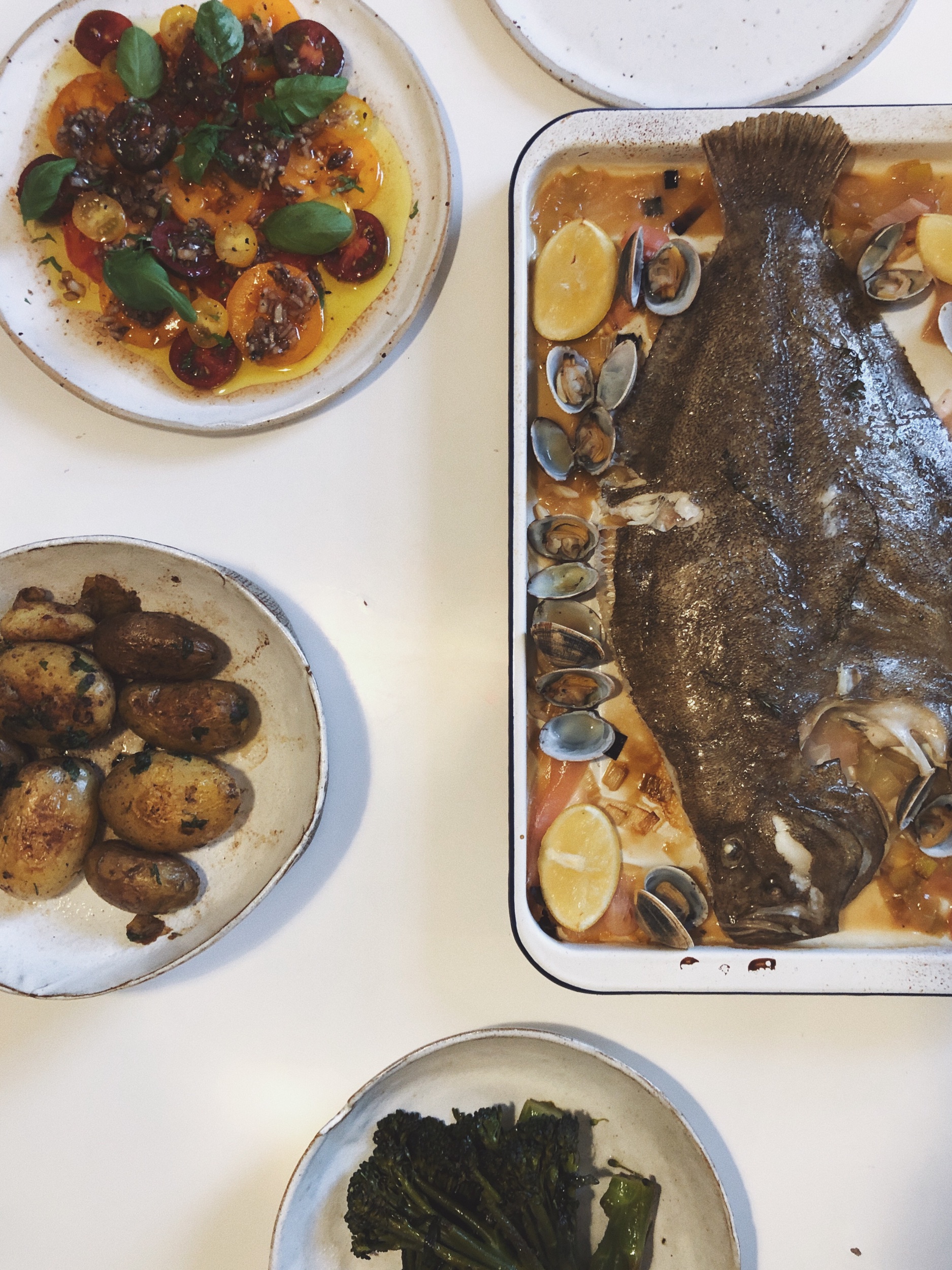 Brill with Clams and Leek, Tomato Salad, Jersey Royals, Tenderstem Broccoli