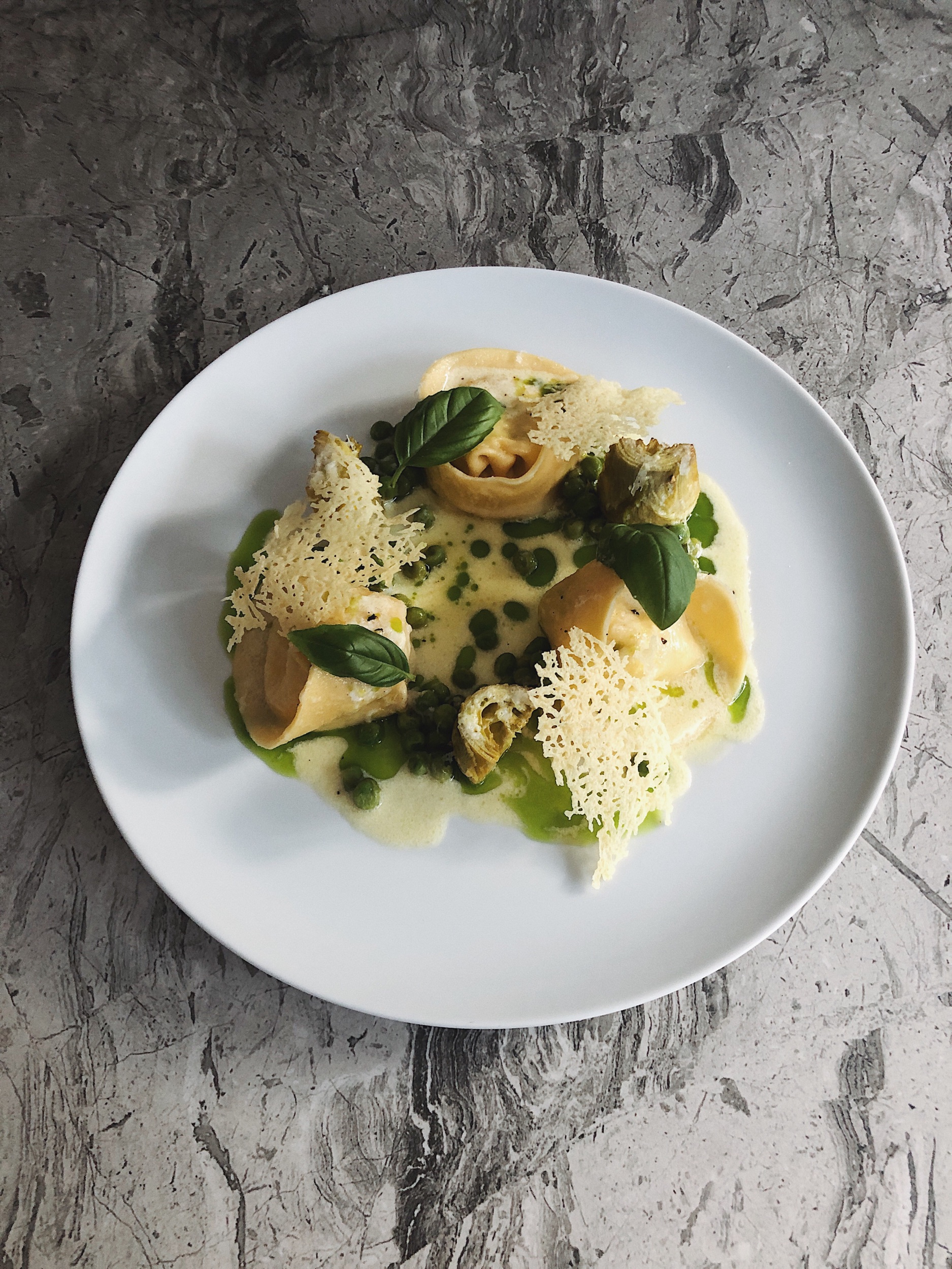 Quail Egg and Ricotta Tortelli, Pecorino Cream, Pecorino Tuile, Artichoke Hearts, Peas, Basil