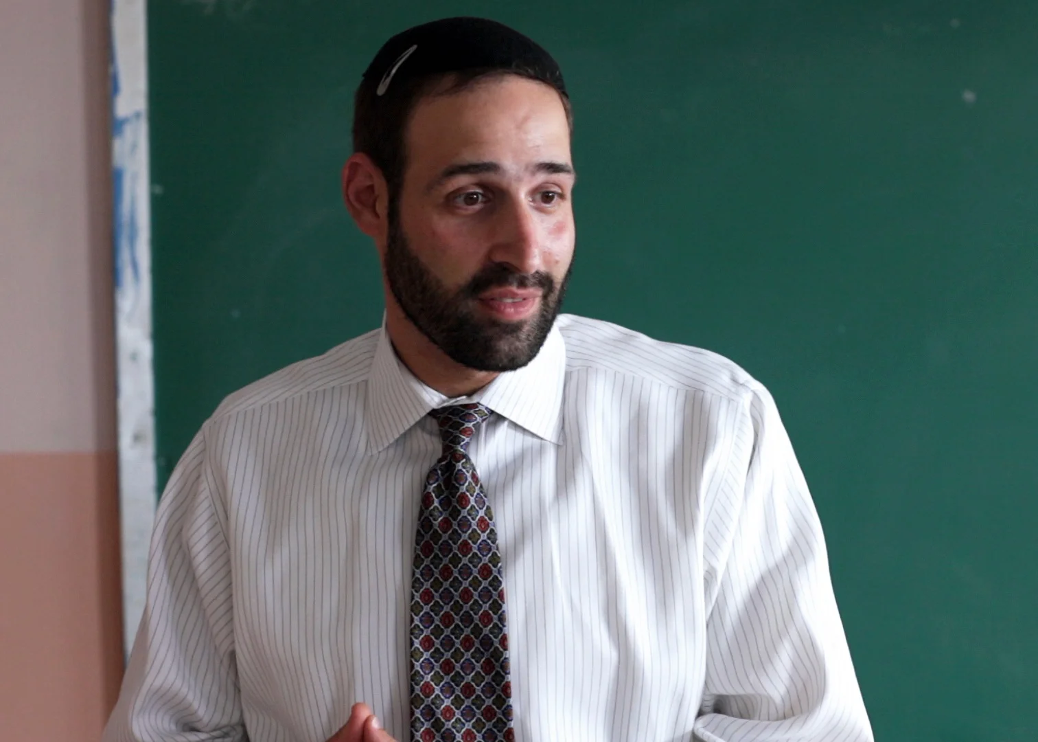 Noam Weinberg (Yeshiva Teacher) David is Noam’s first acting experience in a feature film. He has experience writing and directing plays, and when he is not acting he is the Principal of Judaic Studies in North Shore Hebrew Academy High School in Great Neck New York. Q. How did you get involved in David? A. I got involved in David after seeing a casting call and I decided to follow my dream of acting on screen. I went down to the city one day, did an improved audition and it's all history from there. It was the first real film casting call I went on. I was pretty nervous but at the same time it is something that I love to do and always wanted to do. Q. What was main thing you brought to your character, and took away from playing your character? A. I think I brought a youthfulness to my character which I hoped to portray. It’s important to me that people see teaching as an art and one which you need humor, love and lots of energy to do! I think that what I took away from my character was the importance of seeing each person as an individual with unique struggles and stories. A student is much more than a body filling a desk! Q. What was your favorite moment during production? A. My favorite moment was when all the parents of the kids came onto the set to watch one of the scenes being filmed. It made me feel like they were seeing me as the actor that I always knew I could be. Q. How do you connect with the stories in the film? A. I connect with the film on a deep level. My father is a Holocaust survivor who came to America as a young child. I am a first generation American and while I didn't have the same struggles that David did, I could certainly understand him. In addition it is a story that also deals with identity and ethnic pride. In a time when so many youngsters shun their ethnicity, I was happy to be a part of a project that made people think about what it means to be part of a community and family. Q. Any other comments you would like to make? A. I am blessed to have had this opportunity to work with such an amazing cast and crew. I hope our paths cross again so that we can tell another important story.