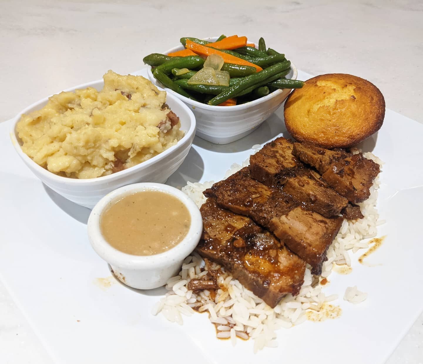 Looking for catering for your holiday company party? We offer prepackaged meals! Call our catering line today 323-918-2087 ext. 2

Picture 1- mashed potatoes, string beans, corn bread, rice and beef brisket

Picture 2- mashed potatoes, string beans, 