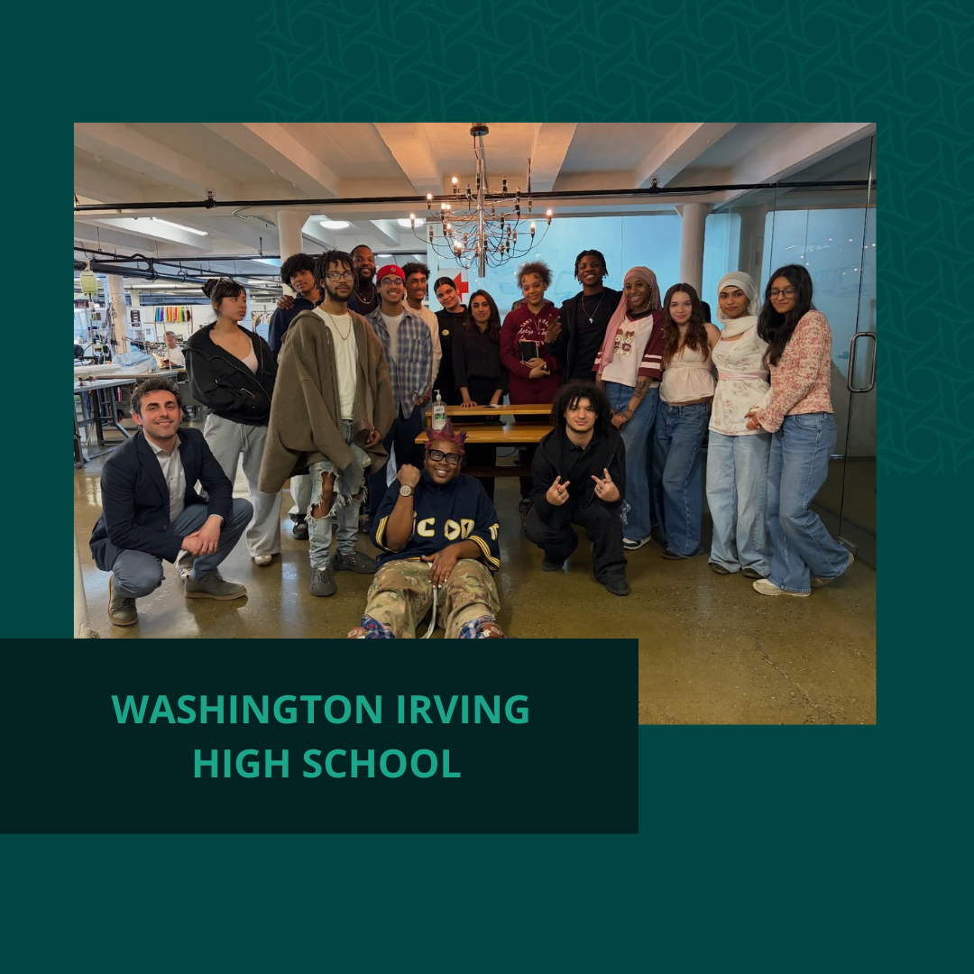 A diverse group of students posing together in a school or community space, with some sitting and others standing, smiling and making gestures.