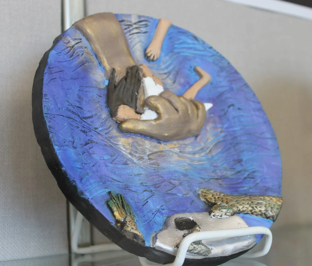 Creepy Mermaids and Broken Cars