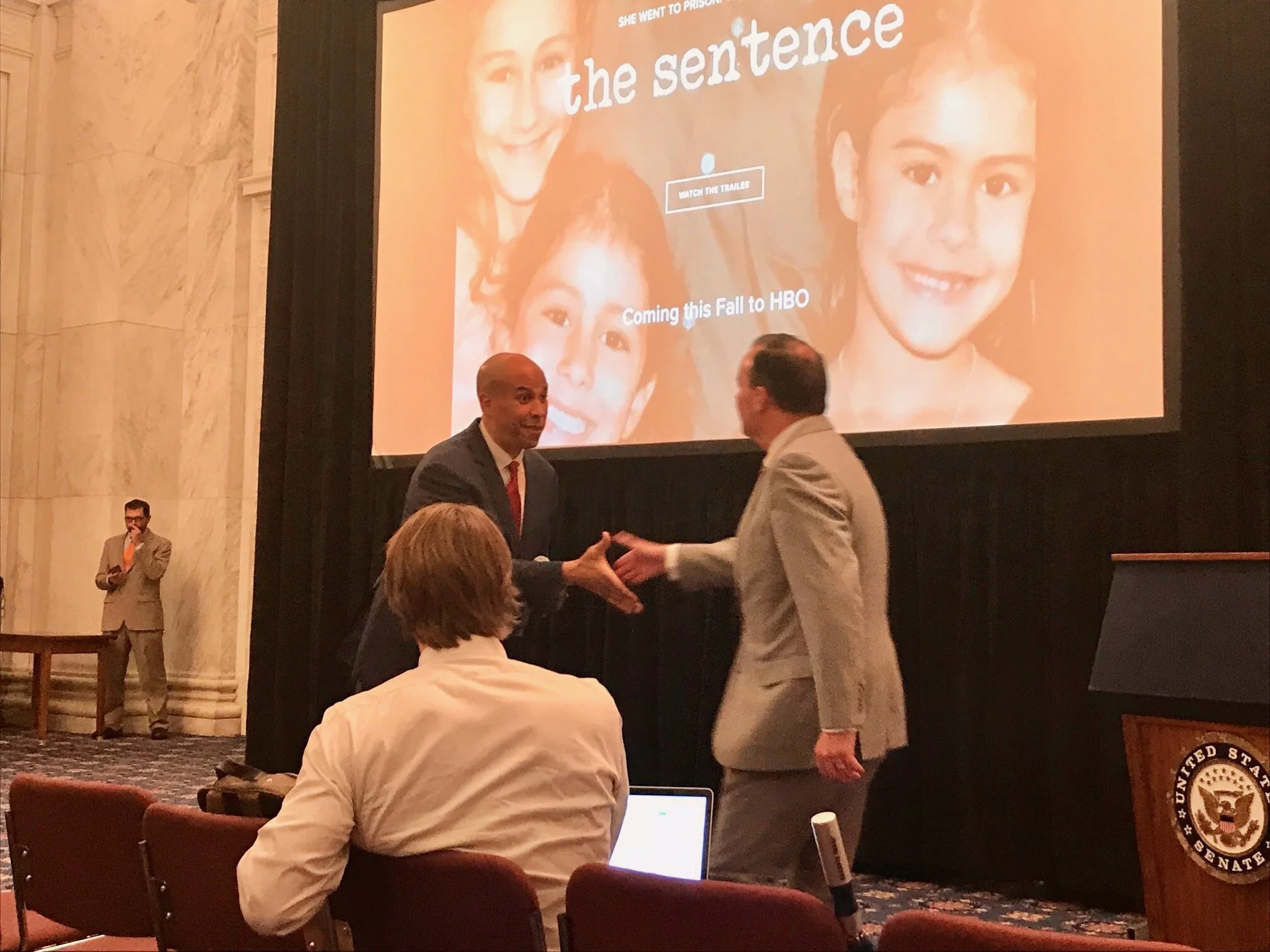 Senators Cory Booker and Mike Lee