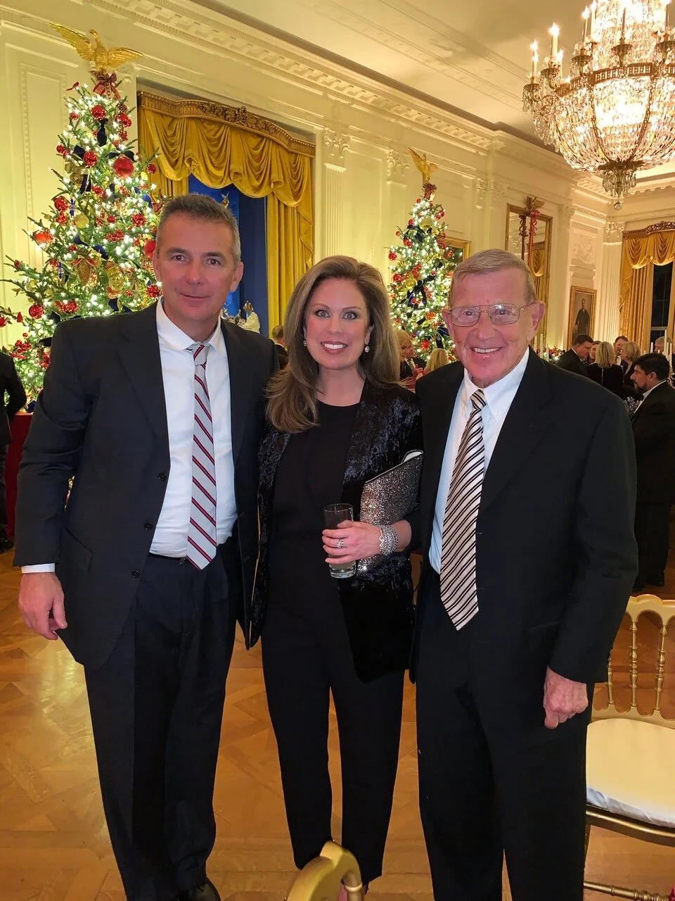 Urban Meyer, Holly Harris, Lou Holtz