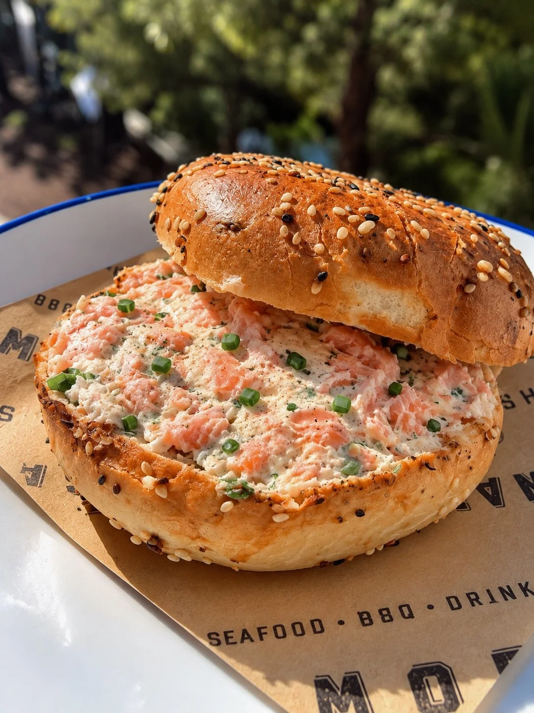 SMOKED SALMON EVERYTHING BAGEL 🥯 A warm, freshly toasted everything bagel generously spread with smoked salmon cream cheese with fresh dill and finely chopped chives&hellip; On special 10|25. Happy Sunday from SWC!