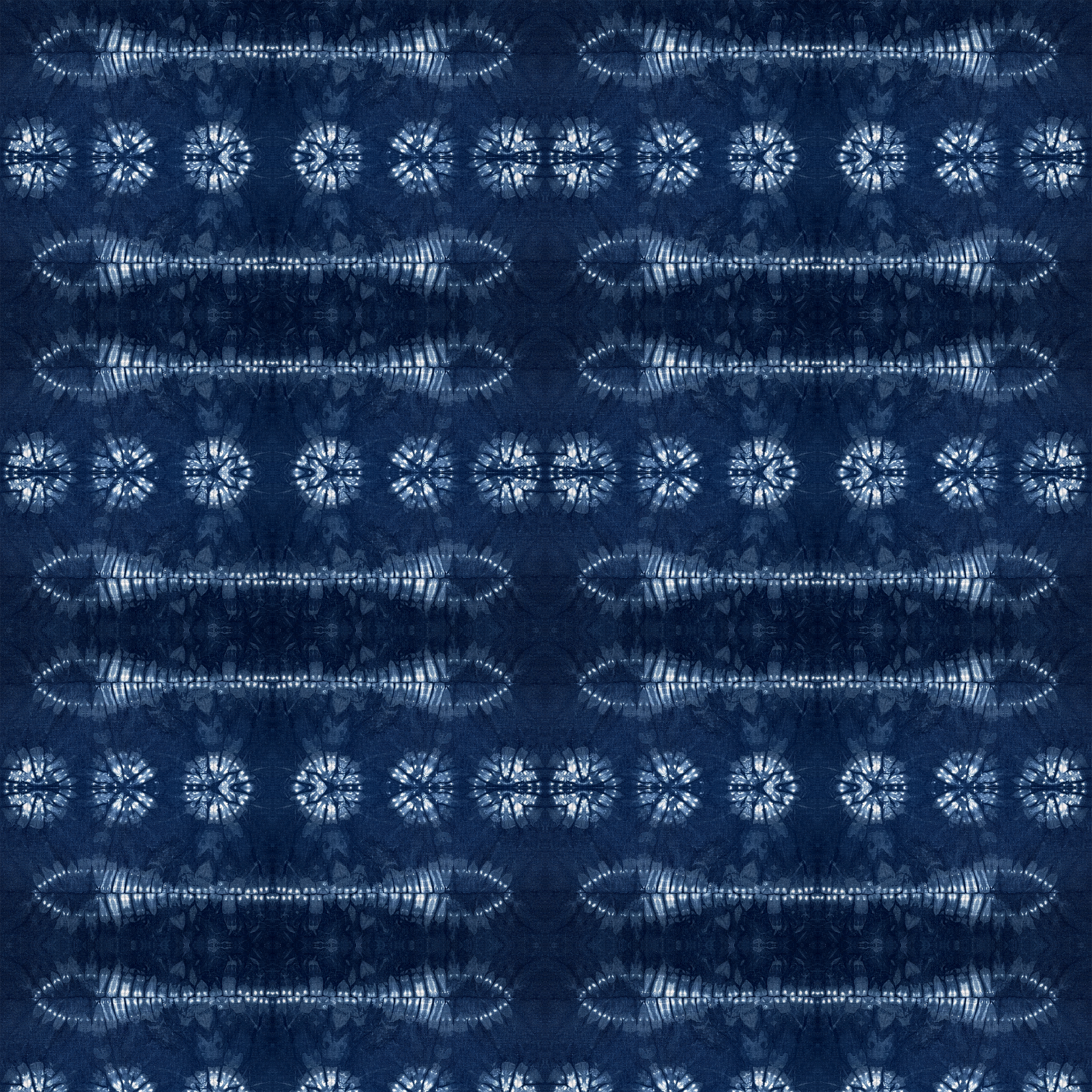Original indigo stitch resit fish surface pattern created from hand dyed fabric for wallpaper and textiles.