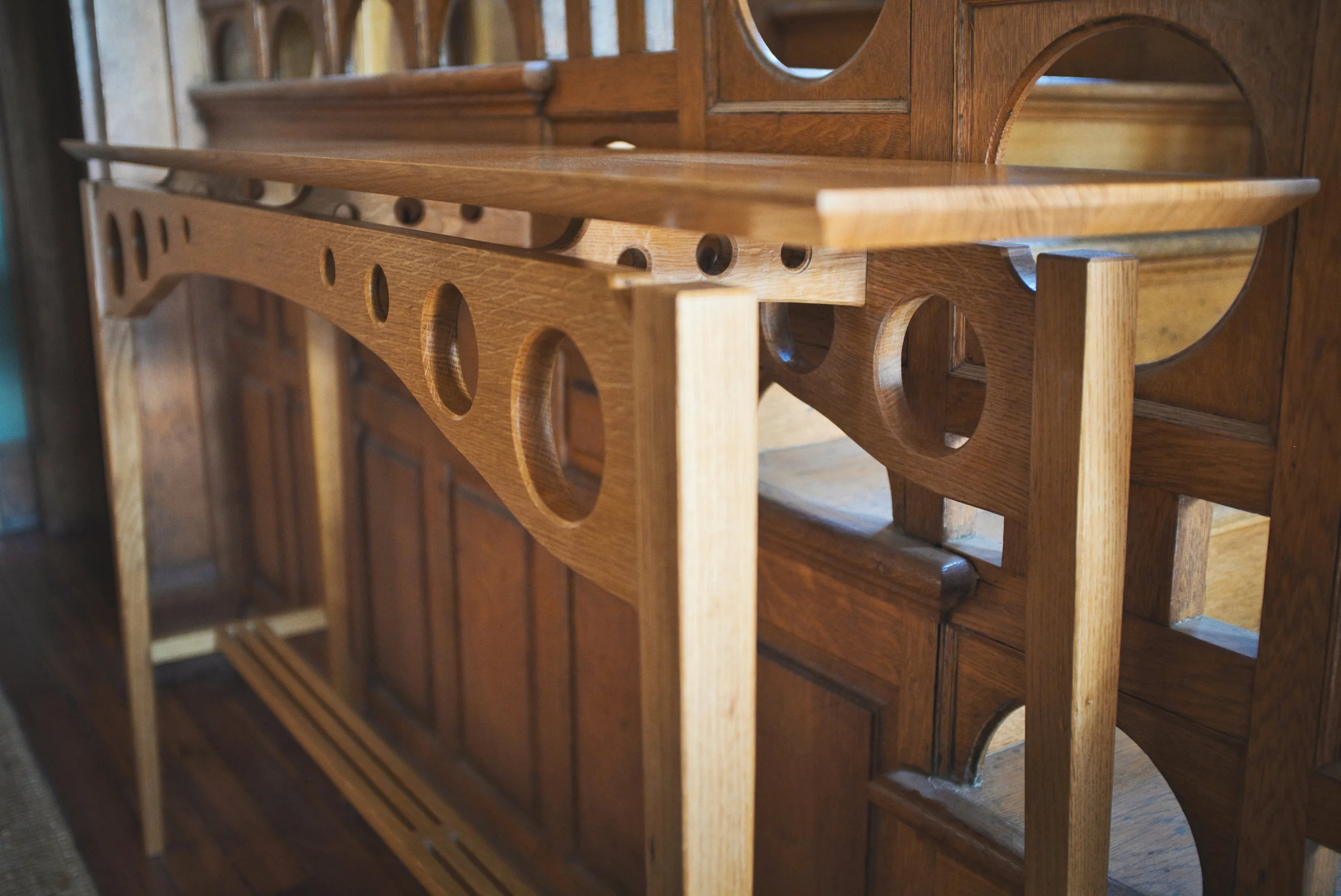  Decorative elements aiming to complement the original 1890s staircase, with a few details to help lighten the look. 