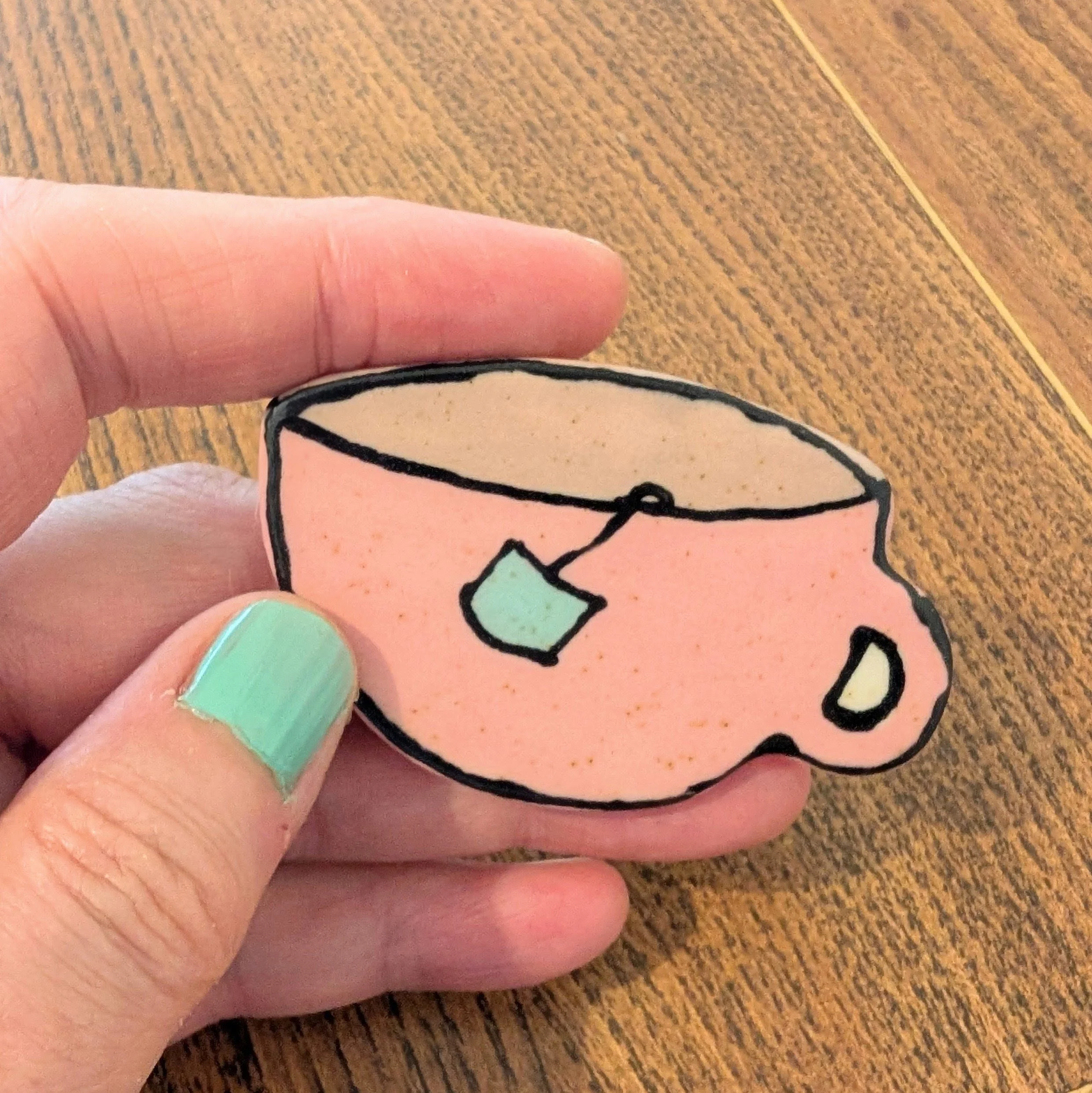 Teacup Brooch_handheld.jpg