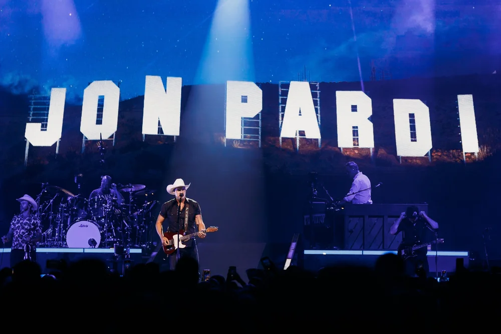 Jon Pardi performing on a concert stage