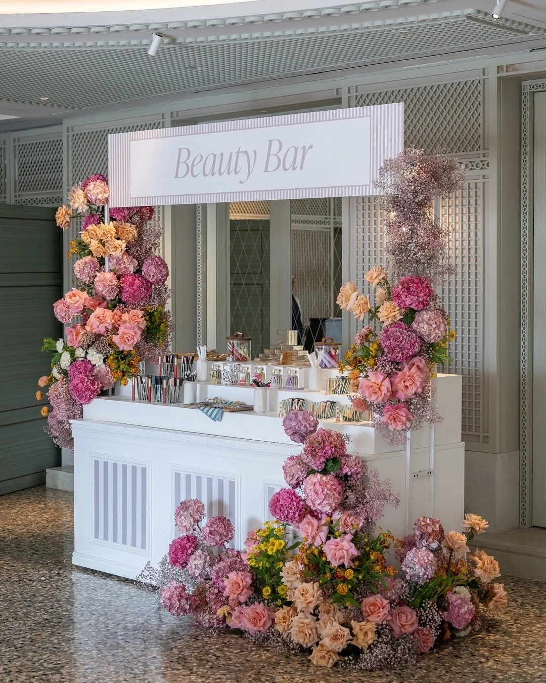 As a final moment of delight from this Italian appreciation trip, our clients were treated to a bespoke beauty bar and custom black suits. The ladies were able to choose from a curated selection of lipsticks and received custom makeup bags, while the